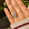 Marquise and round diamond ring with wrap guard band
