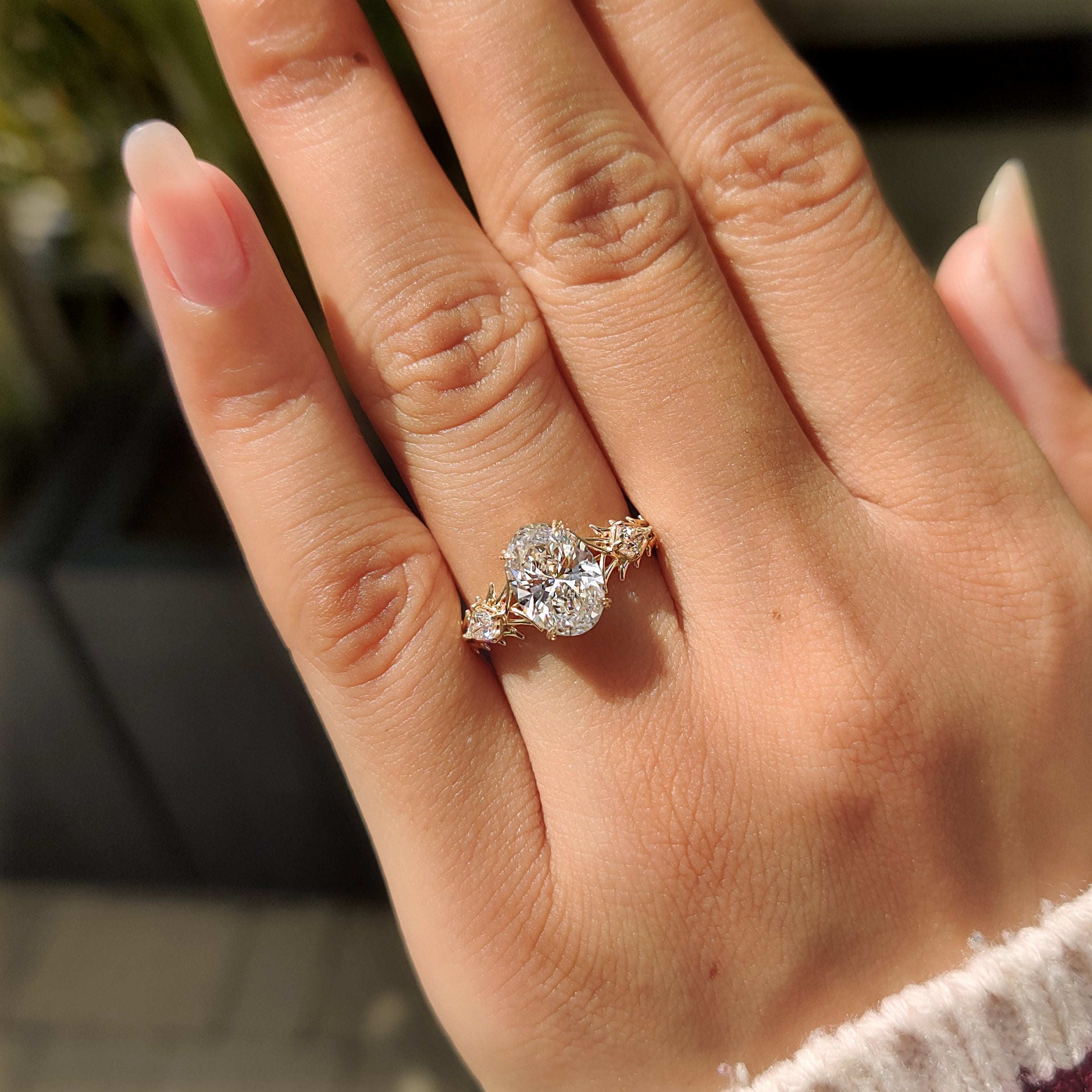 Lab grown oval diamond three stone ring
