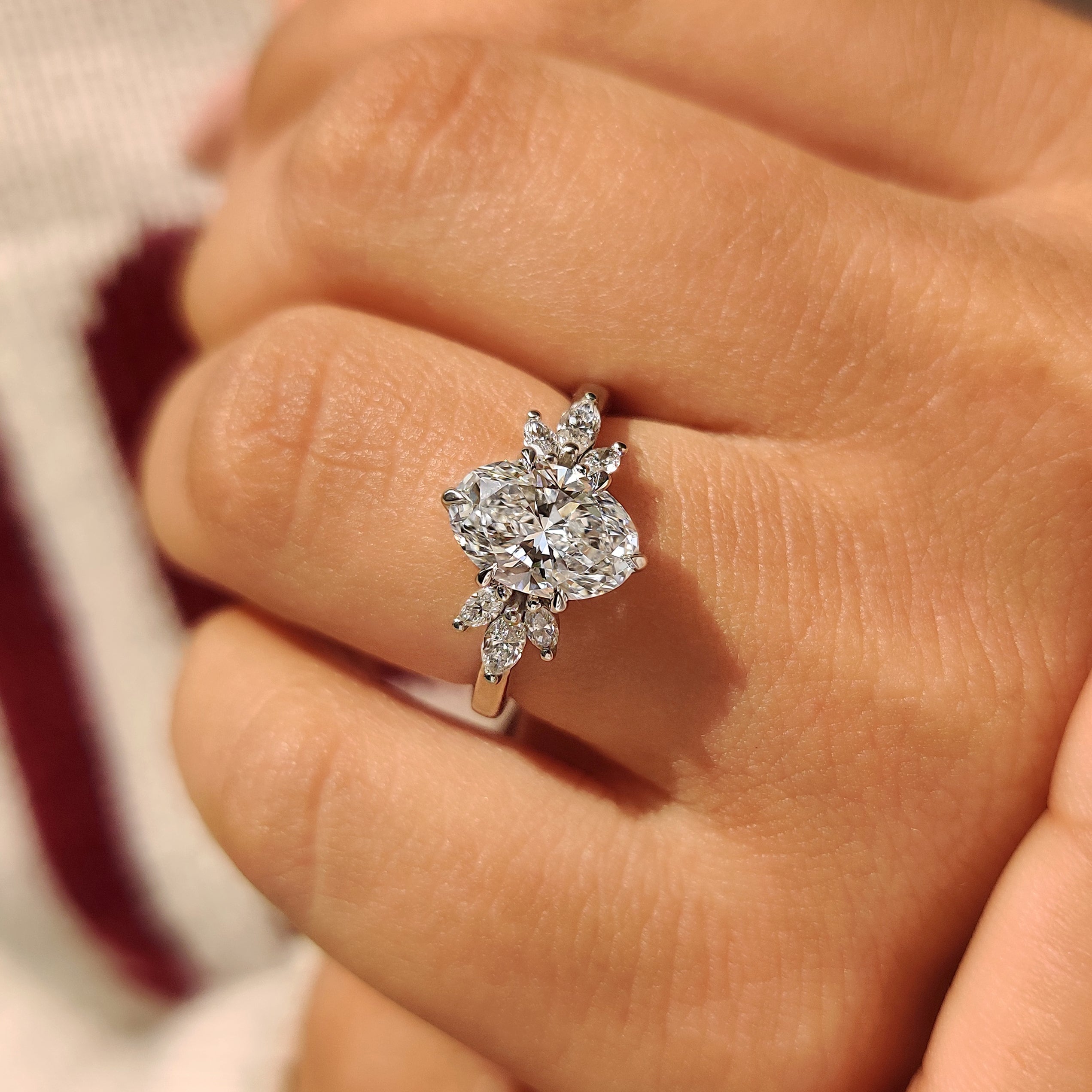 Lab grown oval diamond ring with muse style setting
