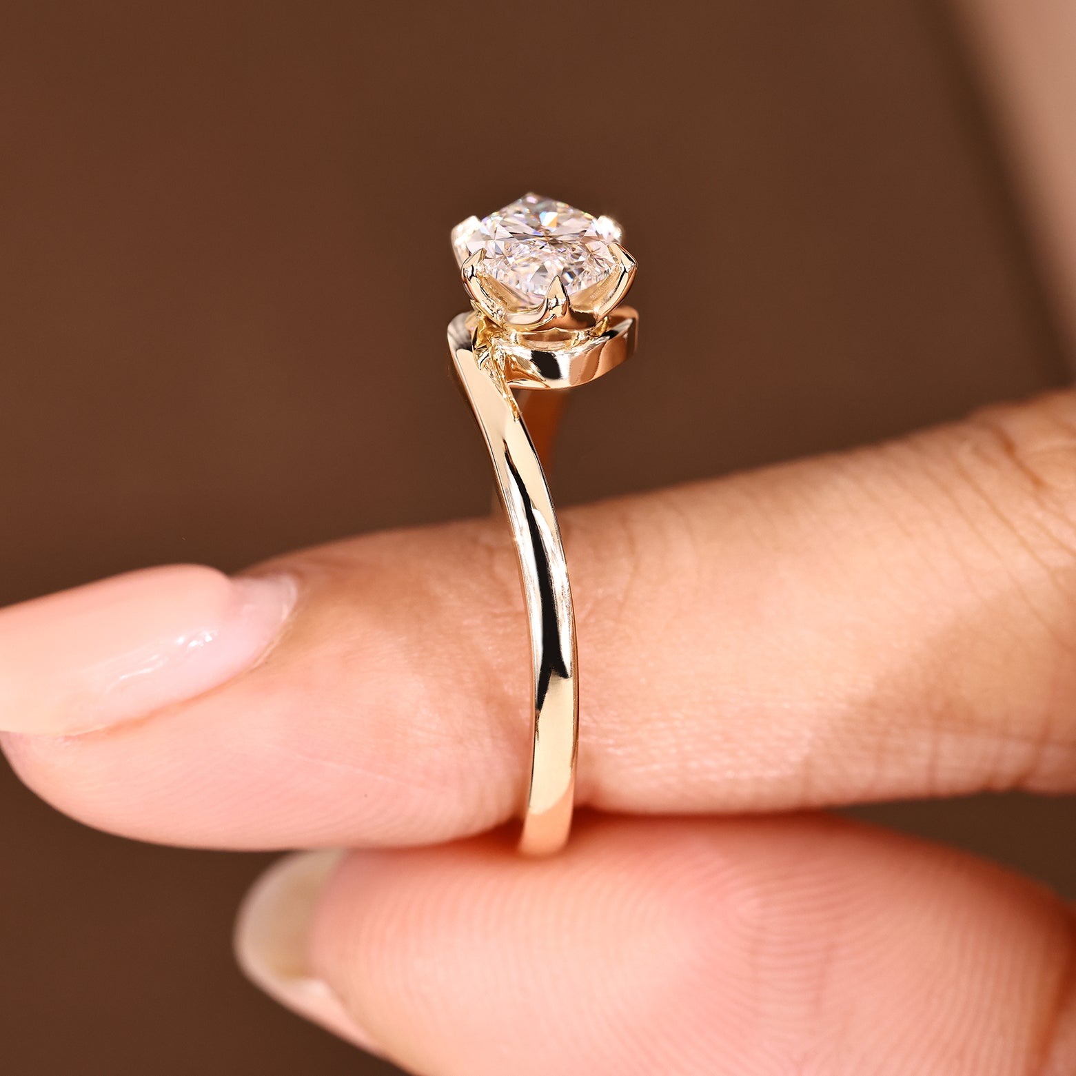 Marquise solitaire ring with six claw prong setting
