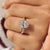 Oval ring with four claw prong setting.
