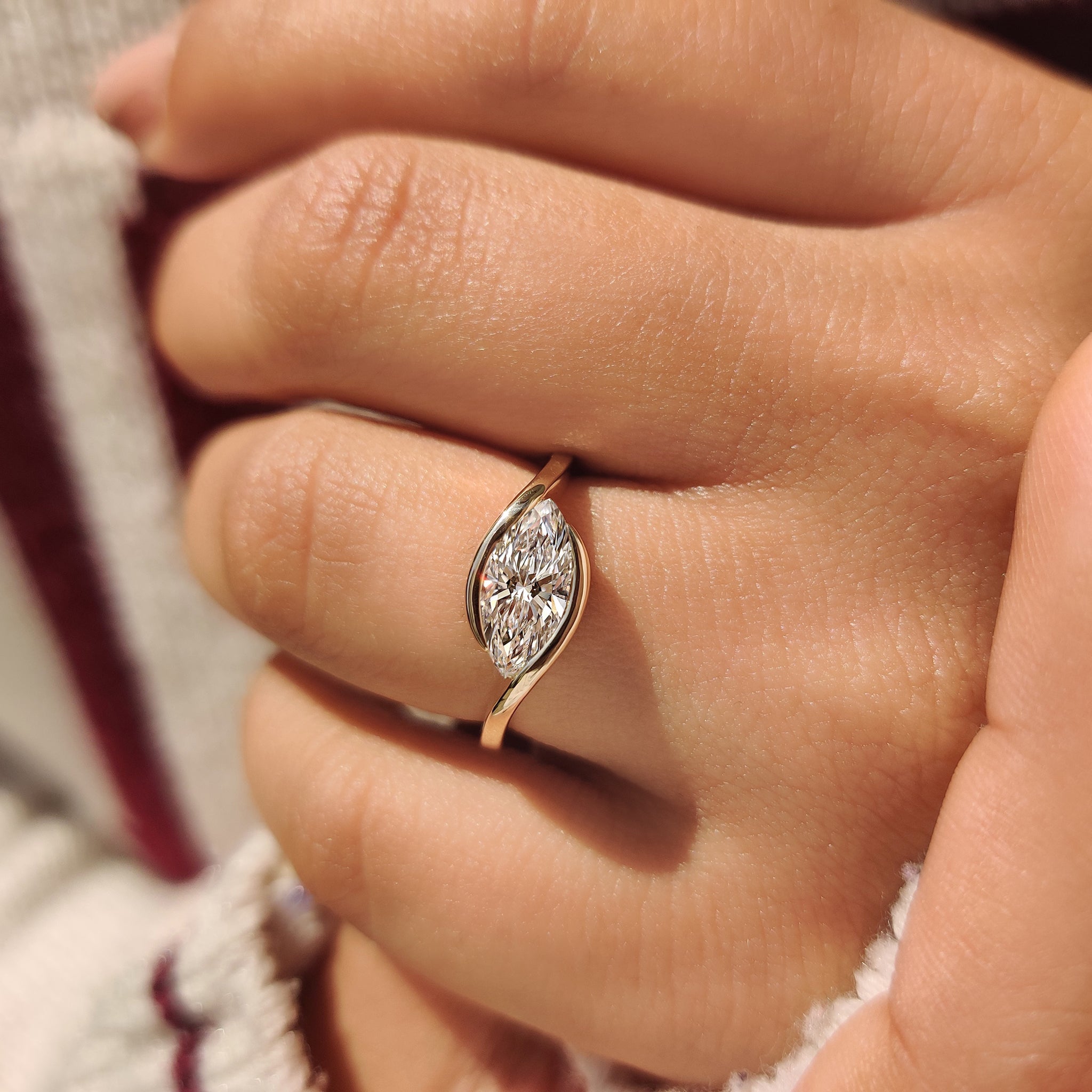 Horizontally set marquise diamond engagement ring
