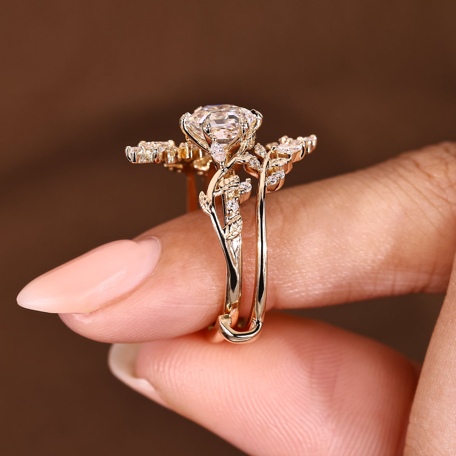 Handmade diamond set with six leaf style prong details
