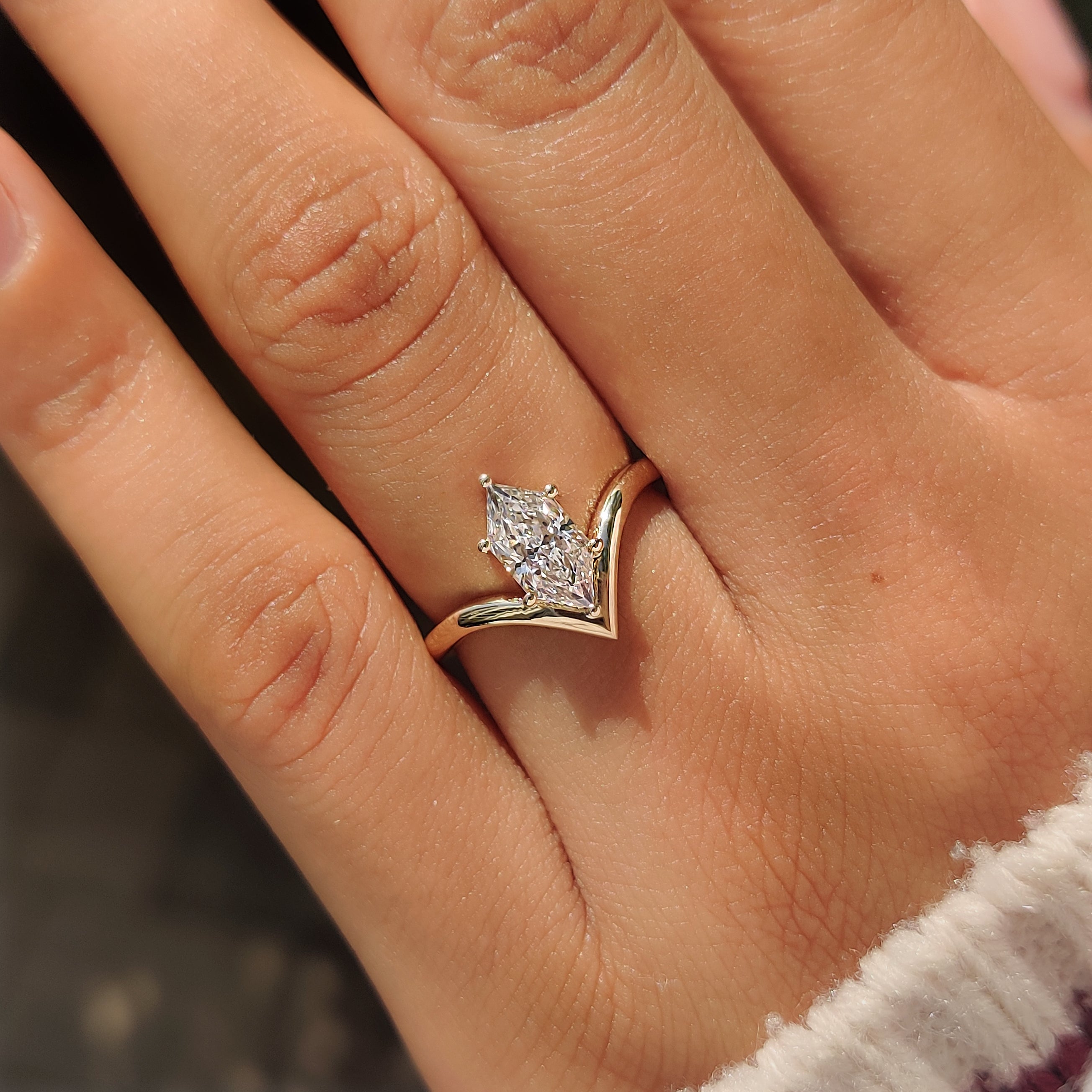 Six prongs securing lab grown Dutch marquise diamond.
