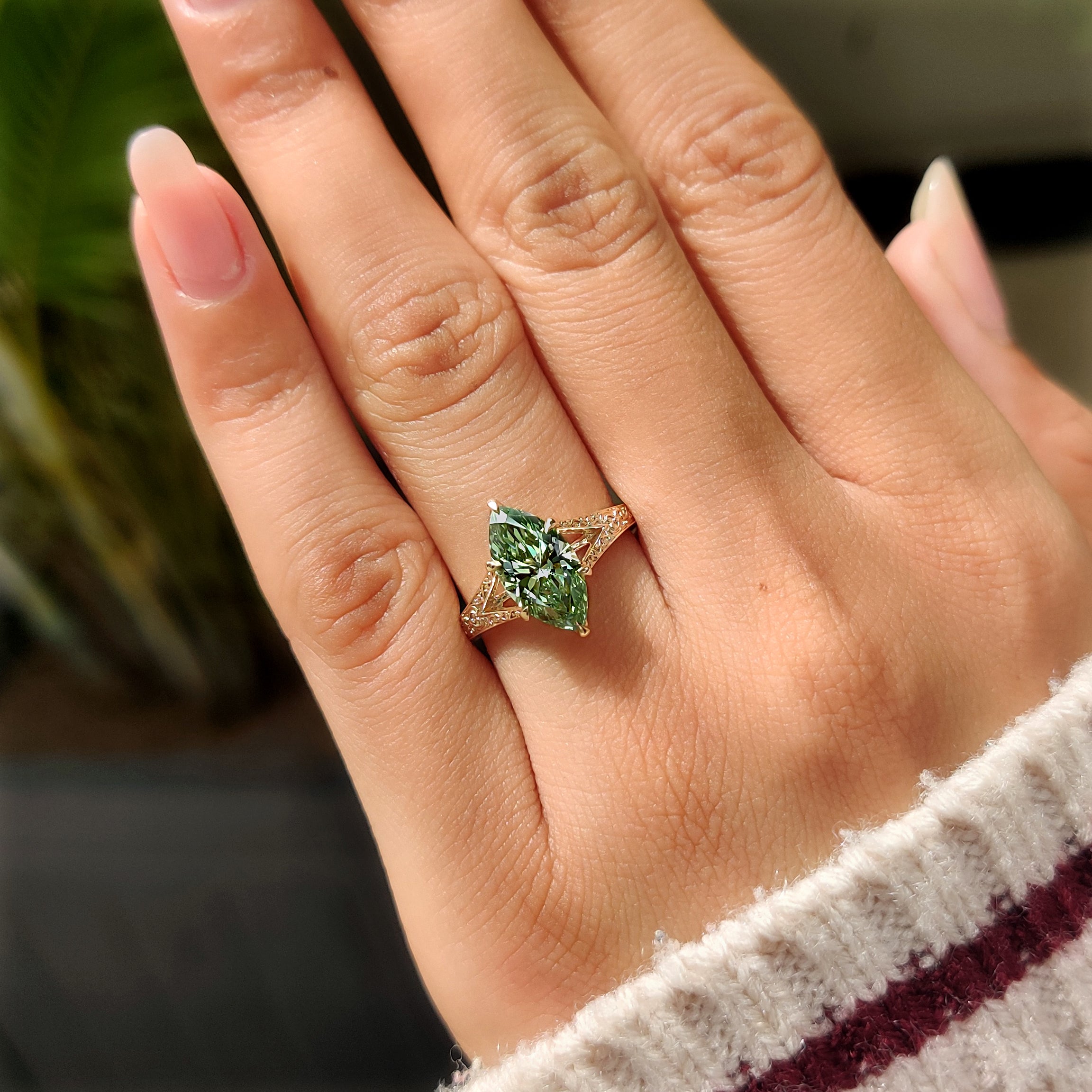 Vintage inspired green marquise solitaire with tulip setting