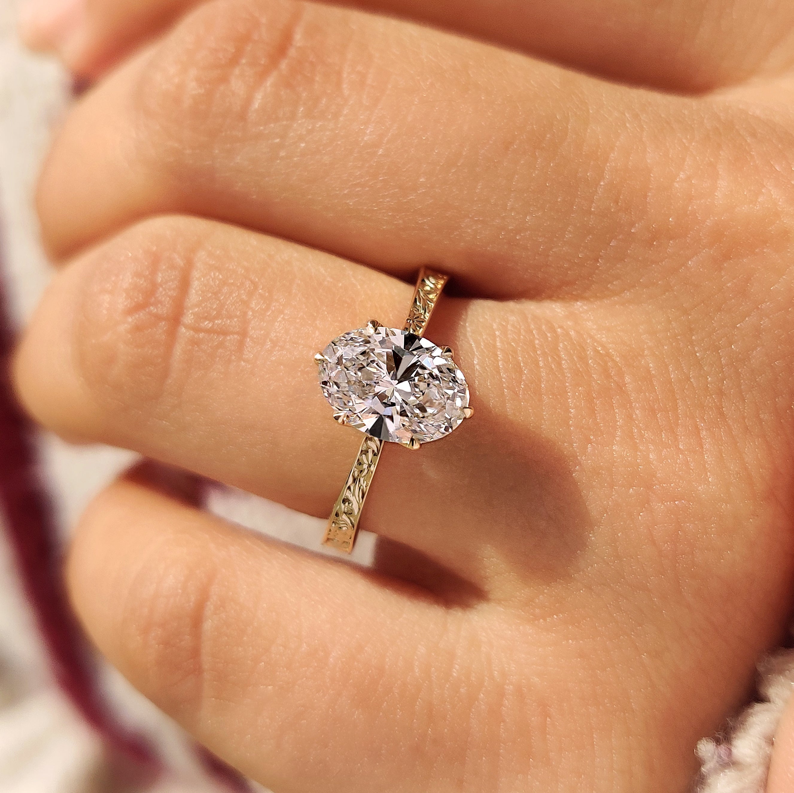 Oval Diamond Ring in Solitaire Setting
