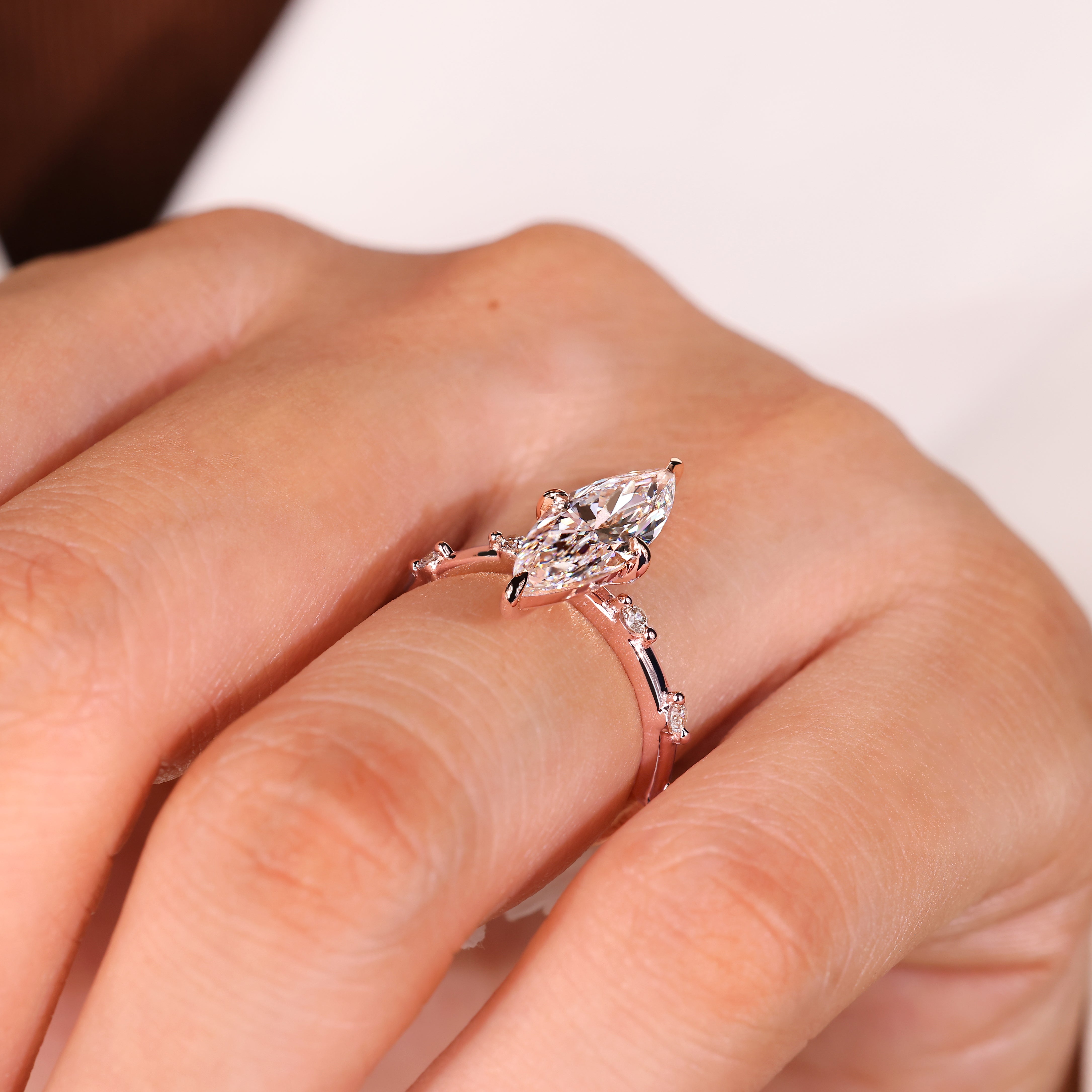 Seven stone marquise engagement ring with pave setting
