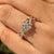 Lab grown hexagon diamond ring with cluster setting design
