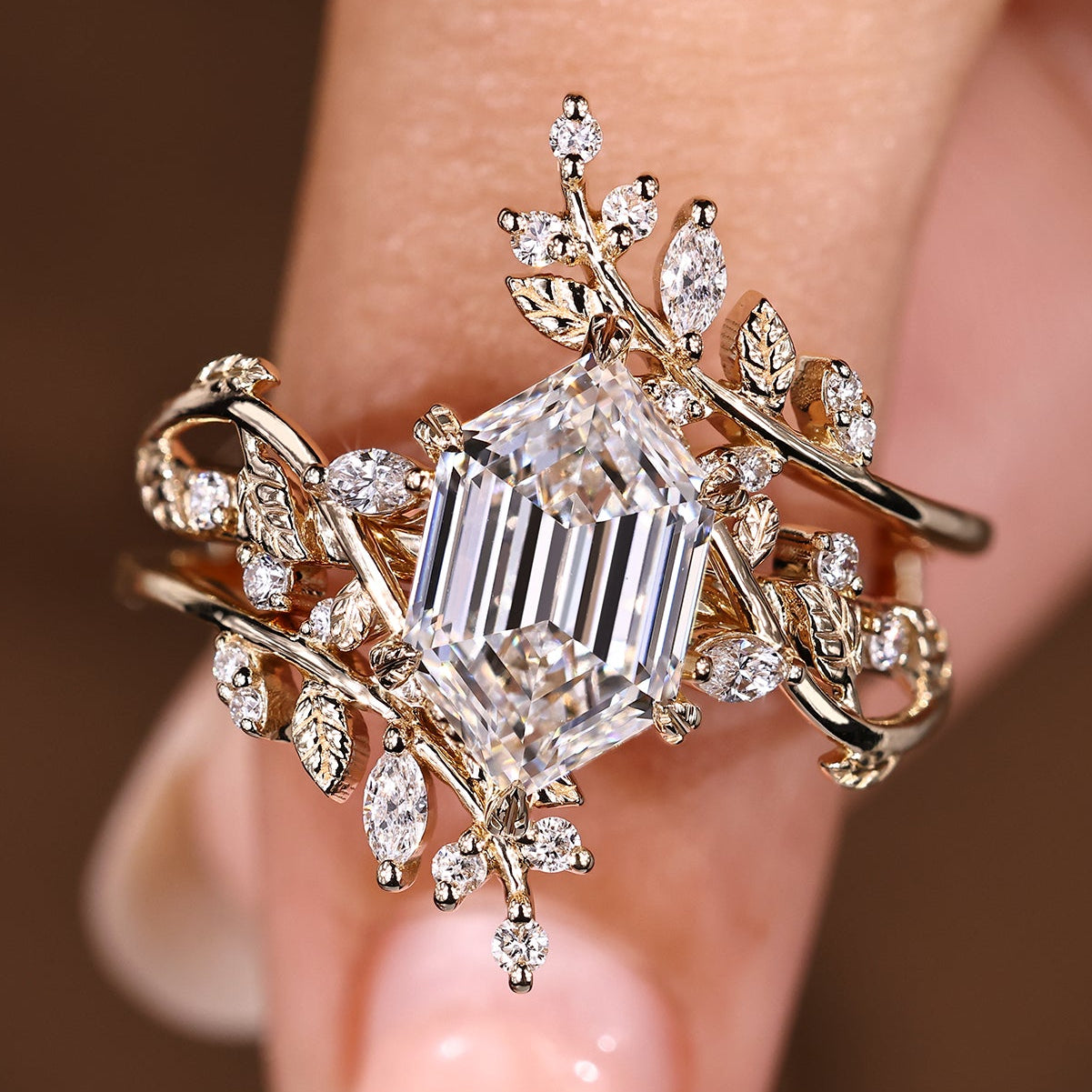 Hexagon diamond engagement ring with matching nature inspired wedding band
