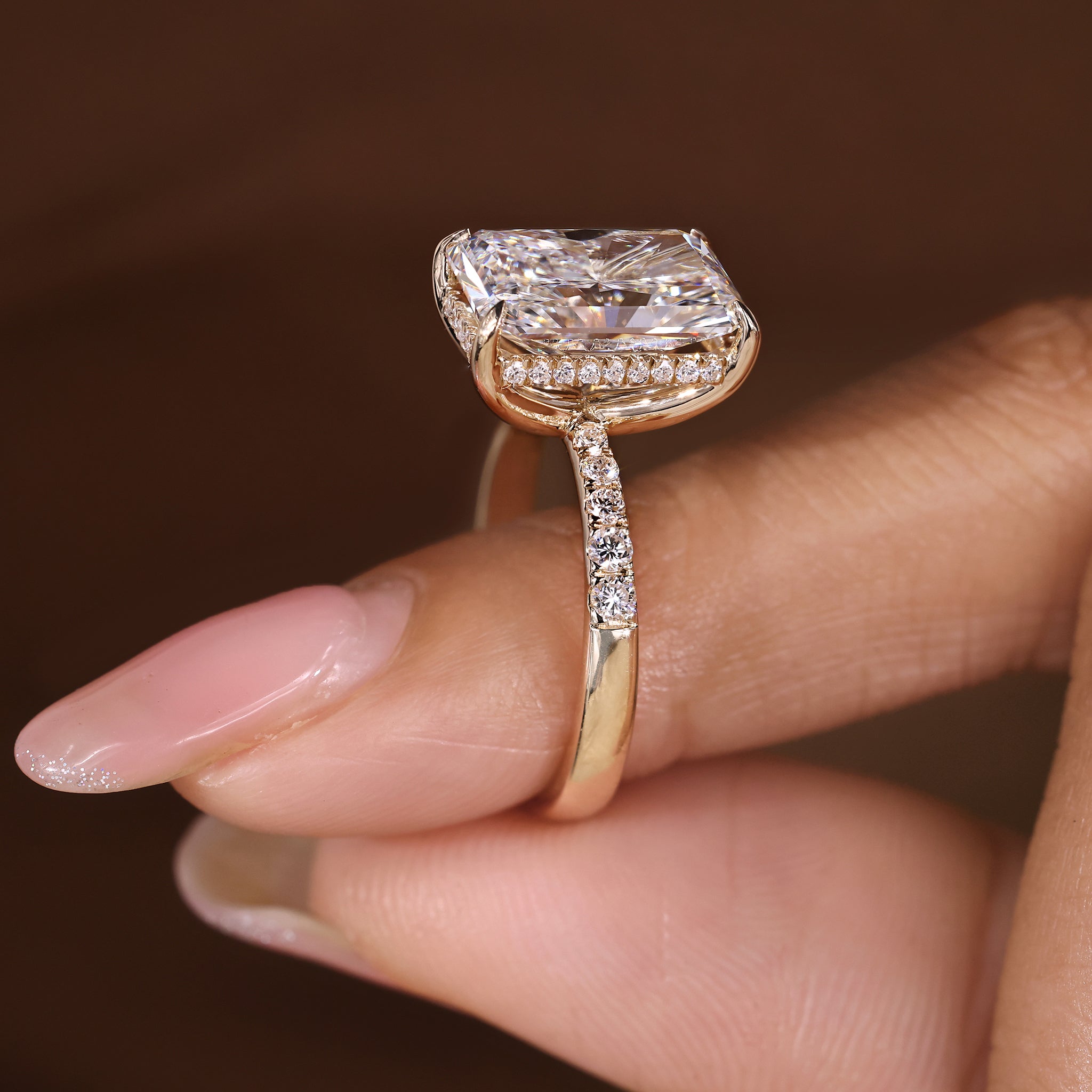 Round pave band radiant cut engagement ring
