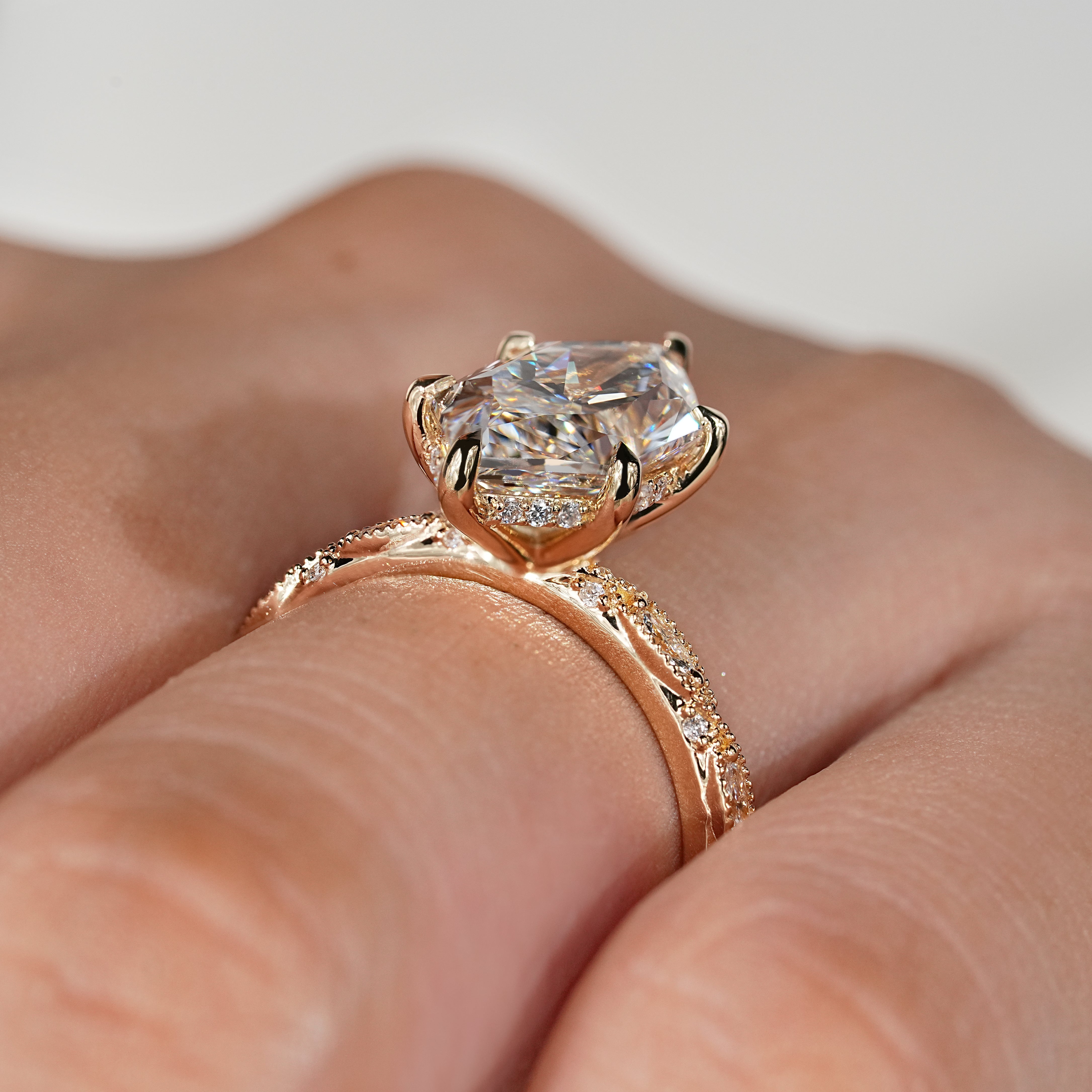 Vintage inspired style with milgrain detailing and hidden halo setting
