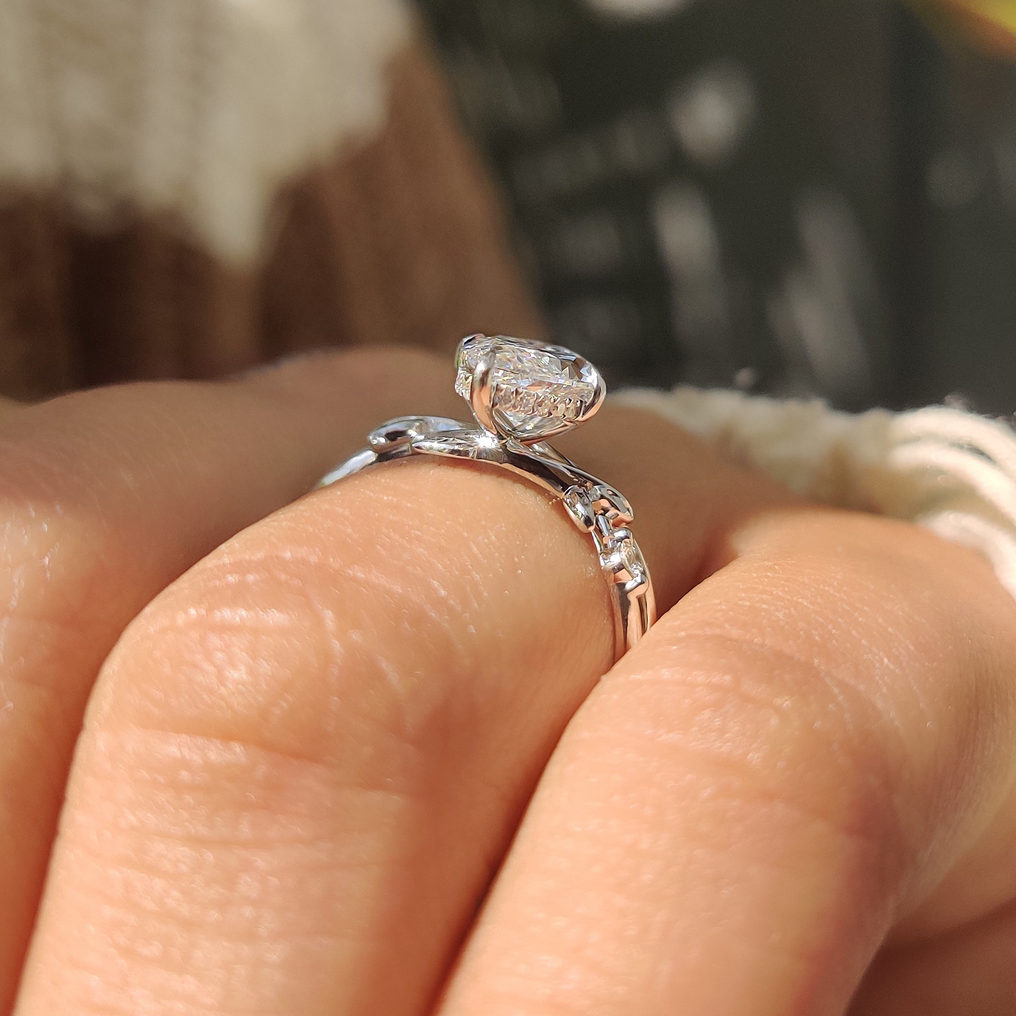 Lab grown marquise diamond ring with hidden halo.
