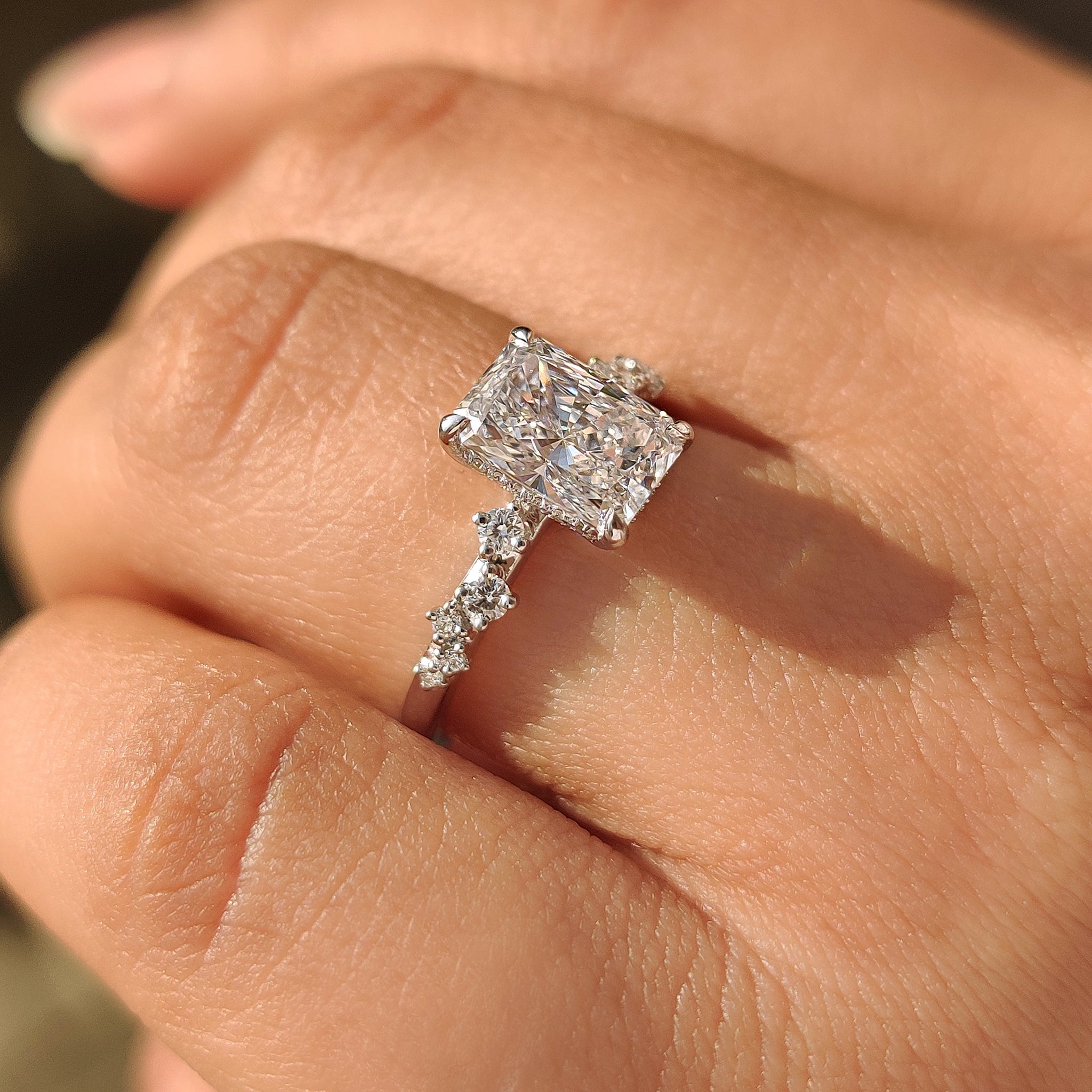 Radiant cut lab grown diamond ring with luxury finish.
