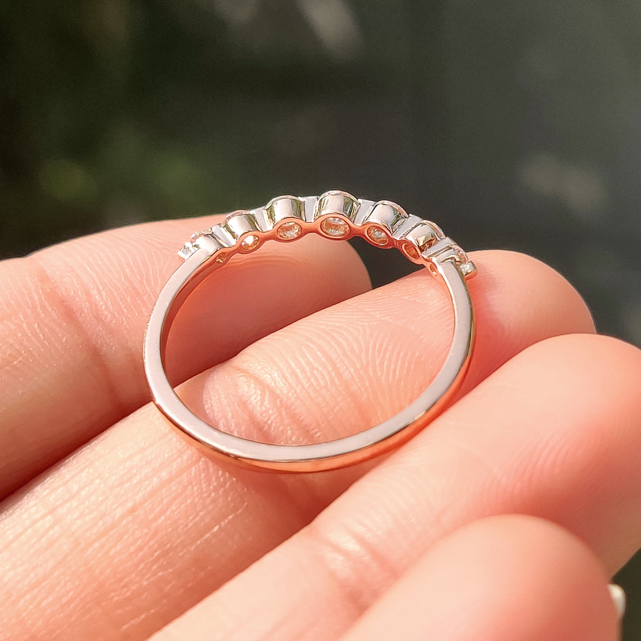 Carat Diamonds band with lab grown round diamond stones.
