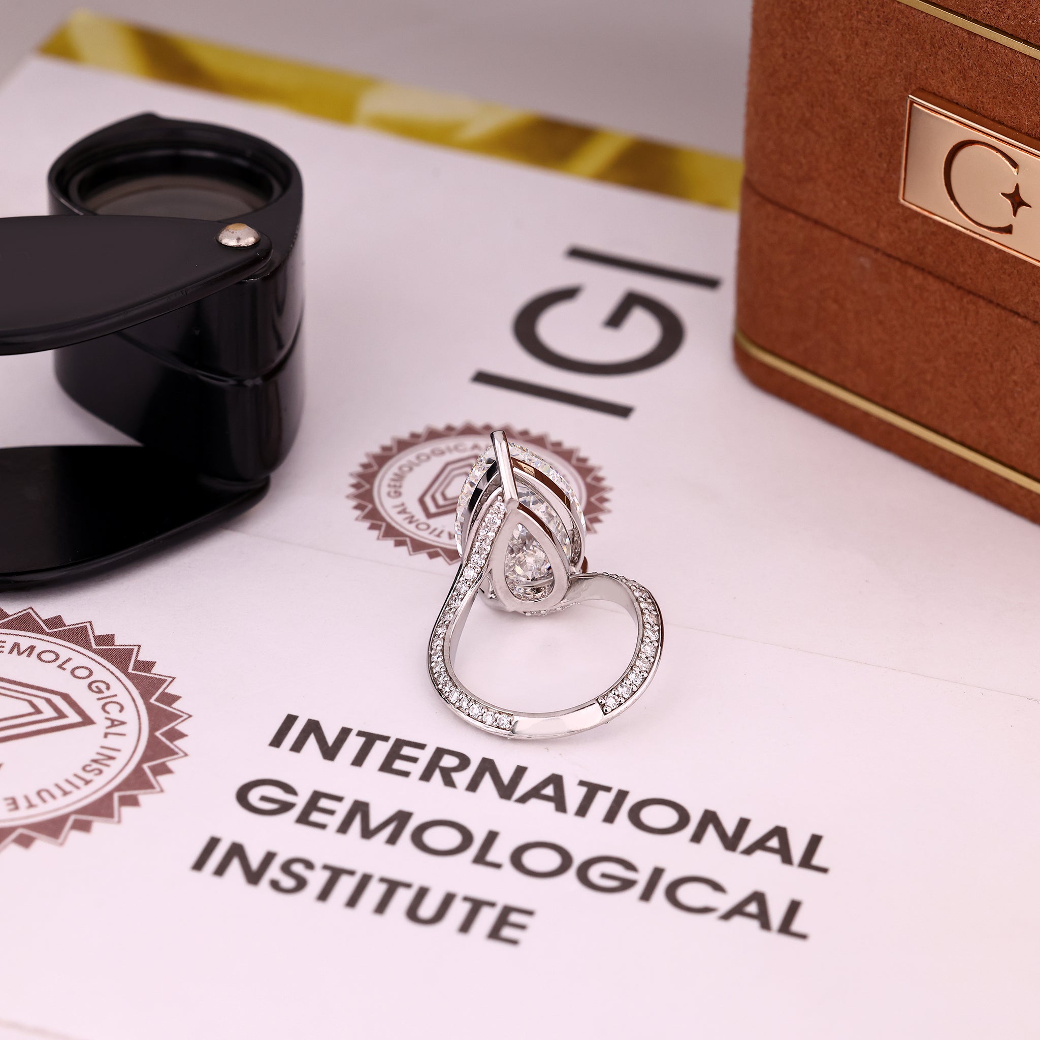 IGI Certified pear lab grown diamond ring with double row pave sparkle.
