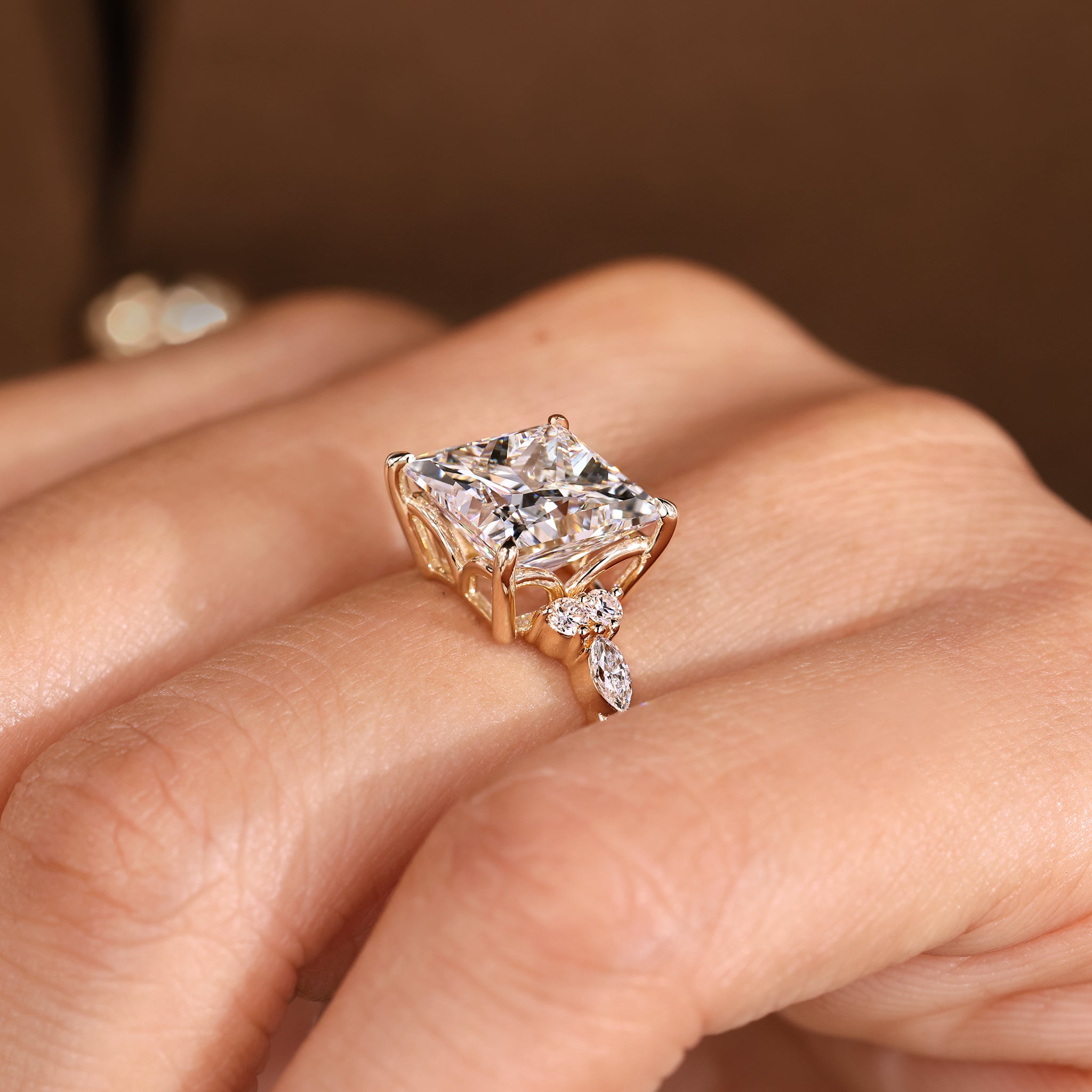 Handmade princess cut diamond ring with modern prong setting.
