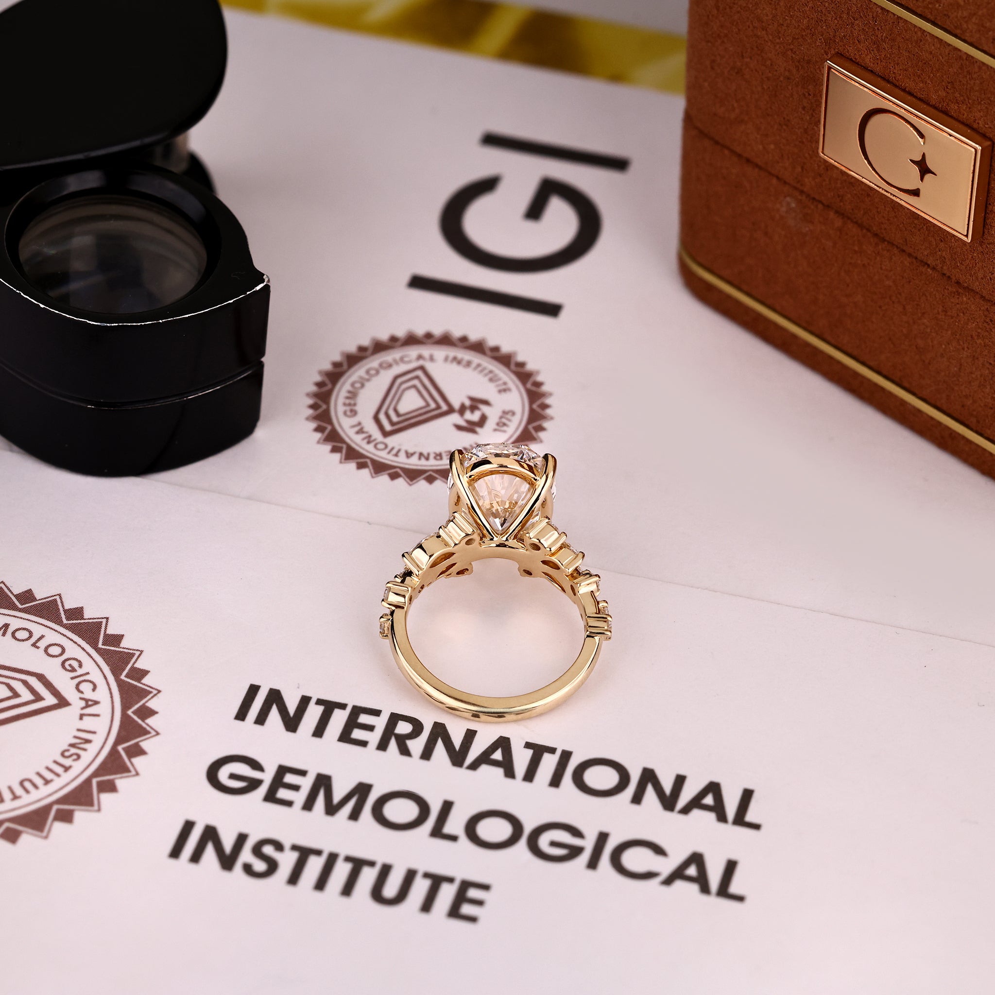 IGI Certified oval cut lab grown diamond ring with elegant cluster sparkle.
