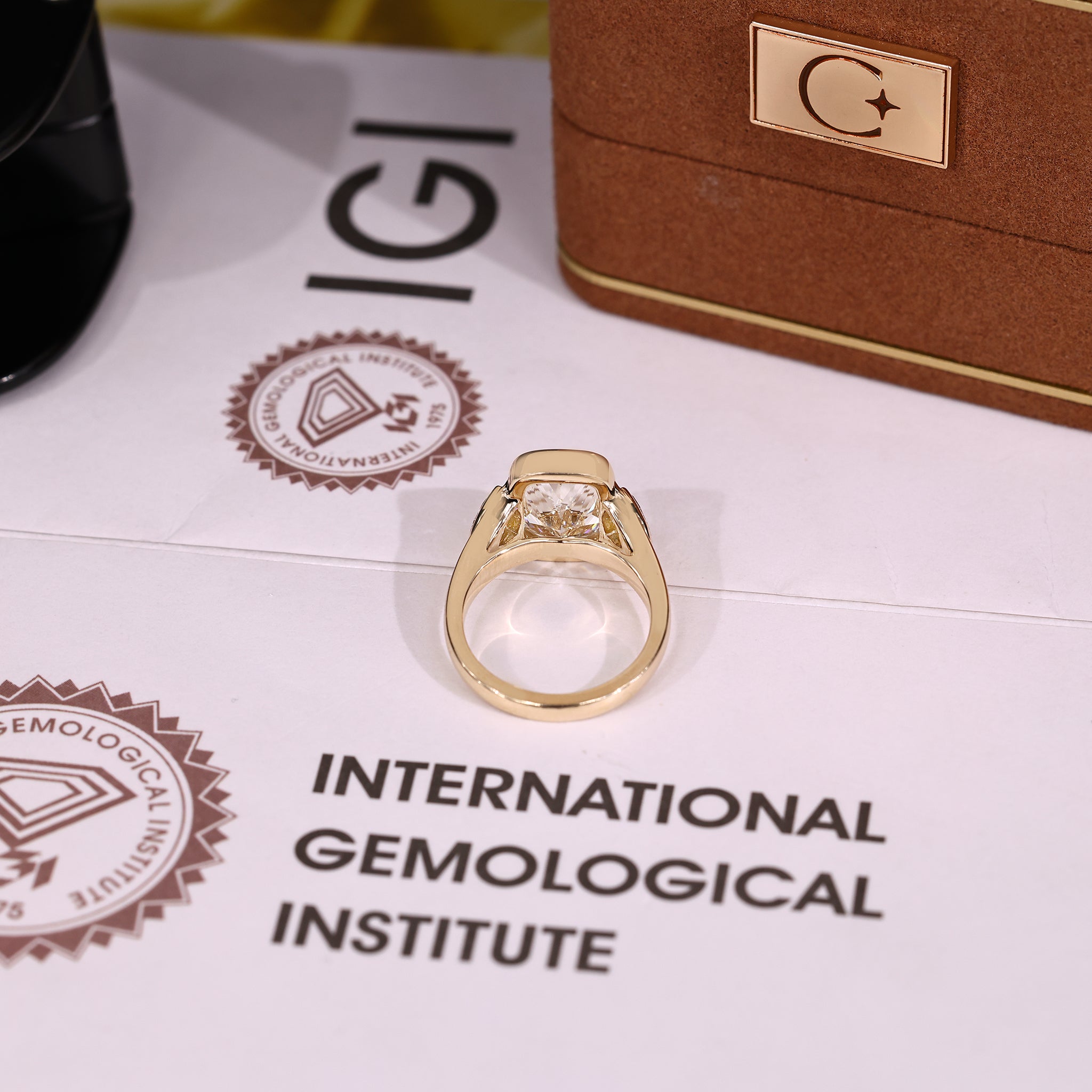 IGI Certified elongated cushion cut diamond ring with cathedral setting
