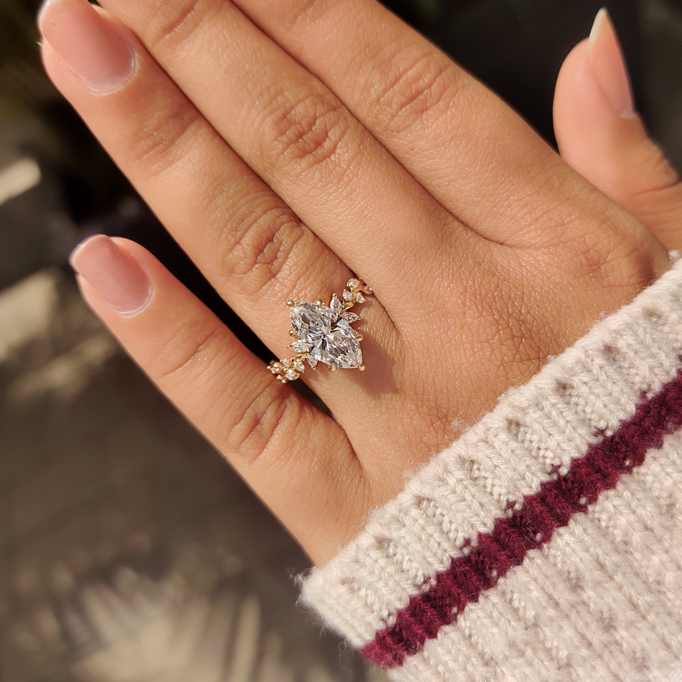 Nature inspired marquise diamond ring with twisted band.
