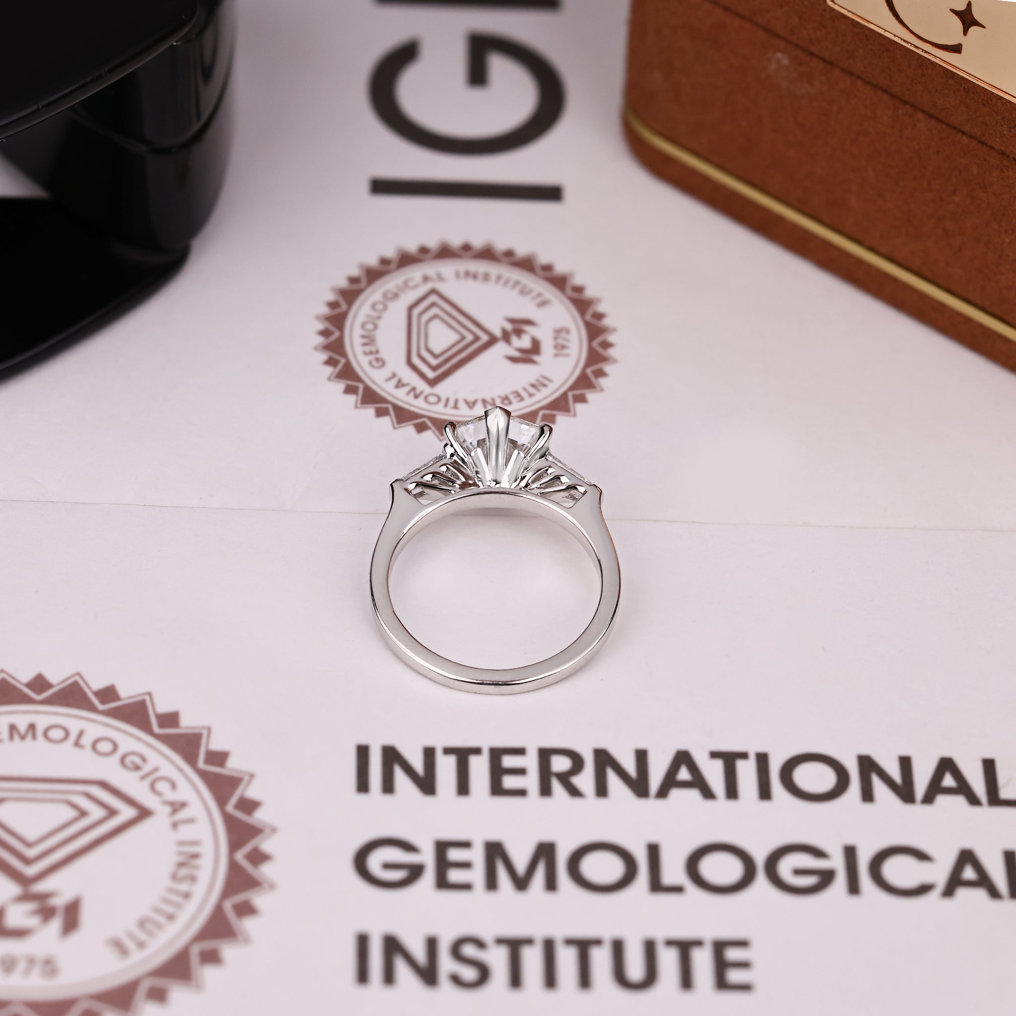 IGI certified hexagon diamond ring with tapered baguettes.
