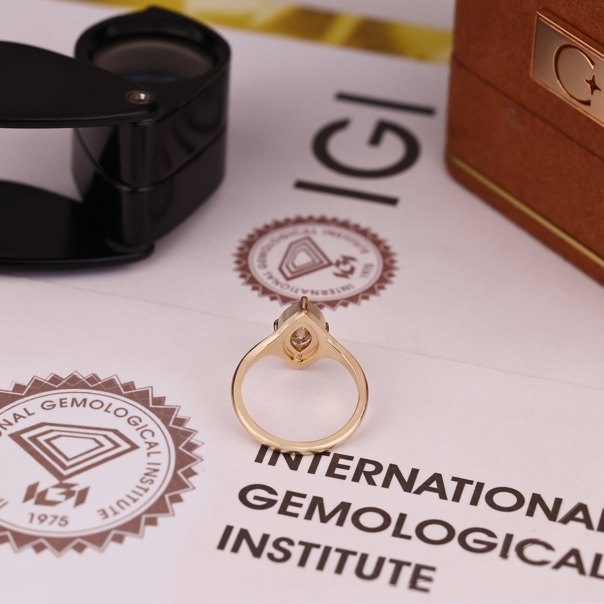 IGI certified marquise engagement ring with four claw prong.
