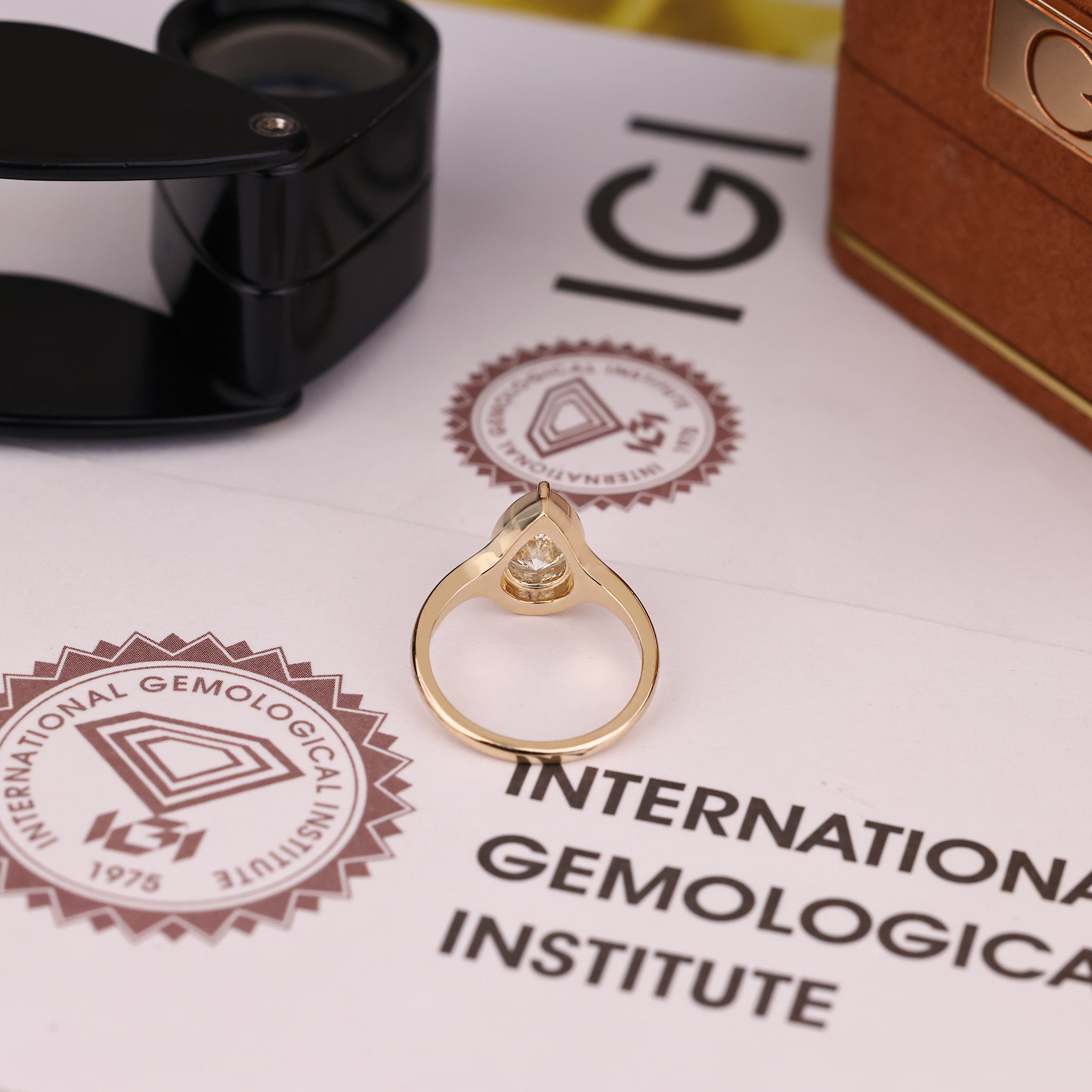 IGI certified pear cut diamond ring by Carat Diamonds.
