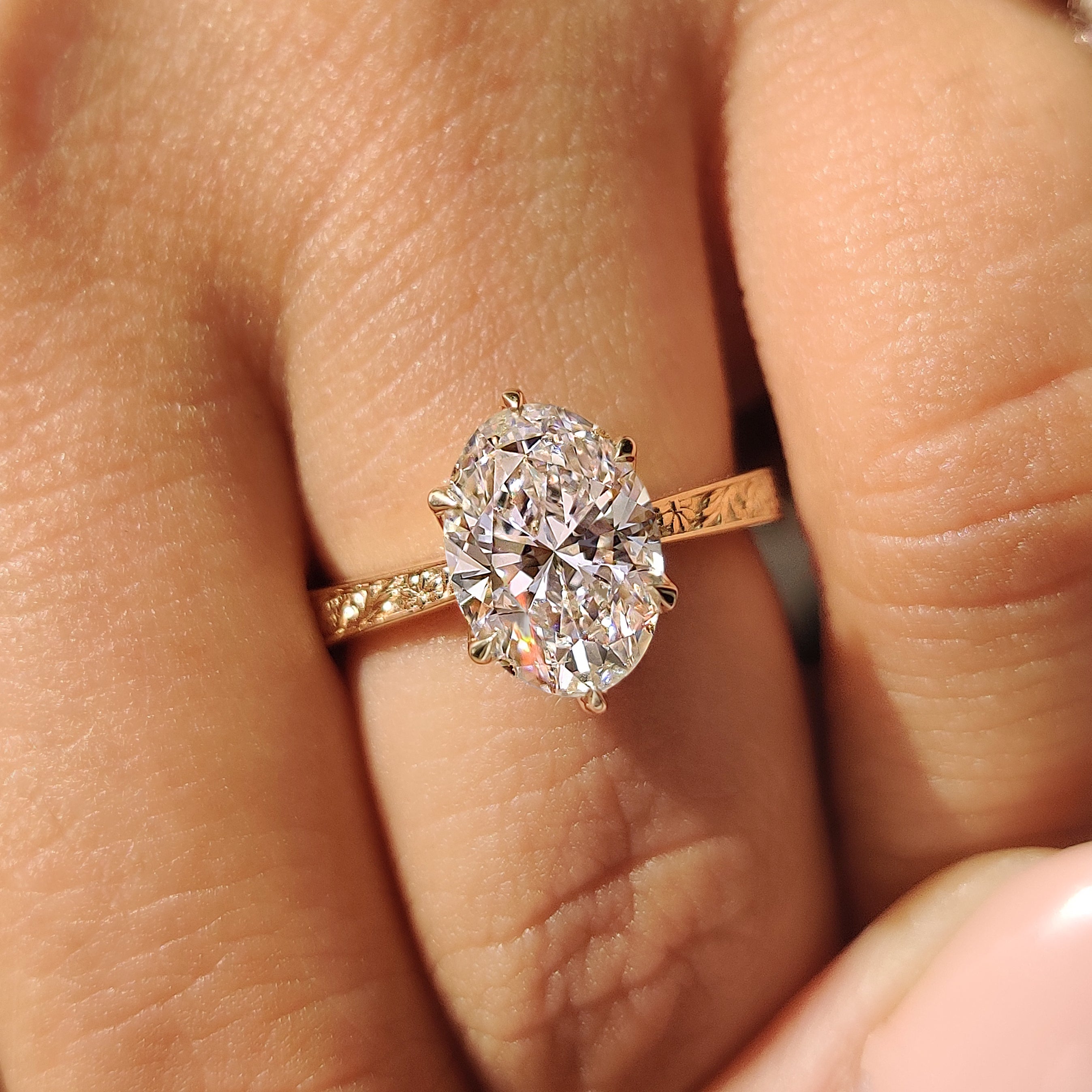 Lab grown oval diamond ring with vintage style details
