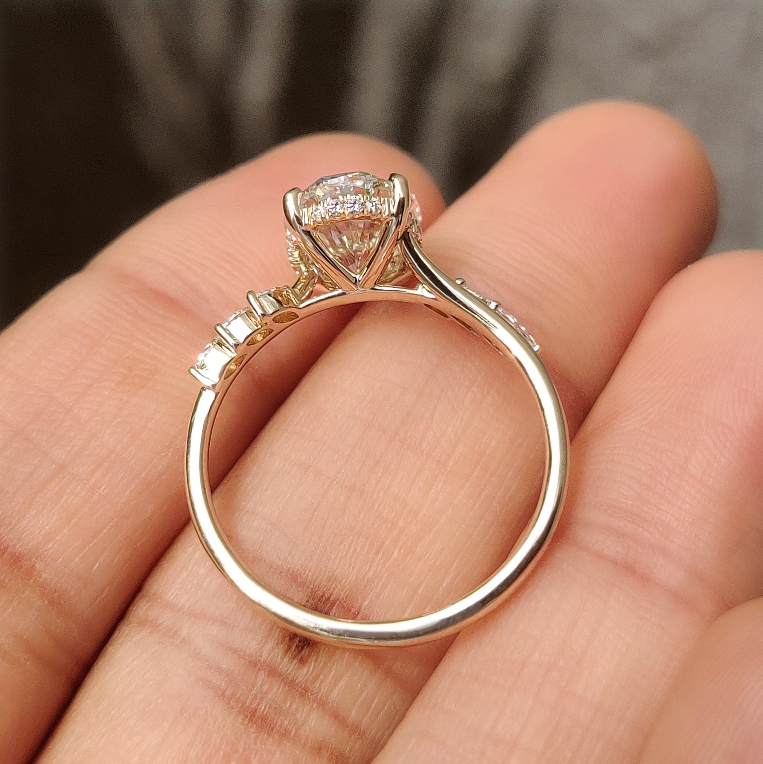 Seven stone ring with oval and marquise diamonds.
