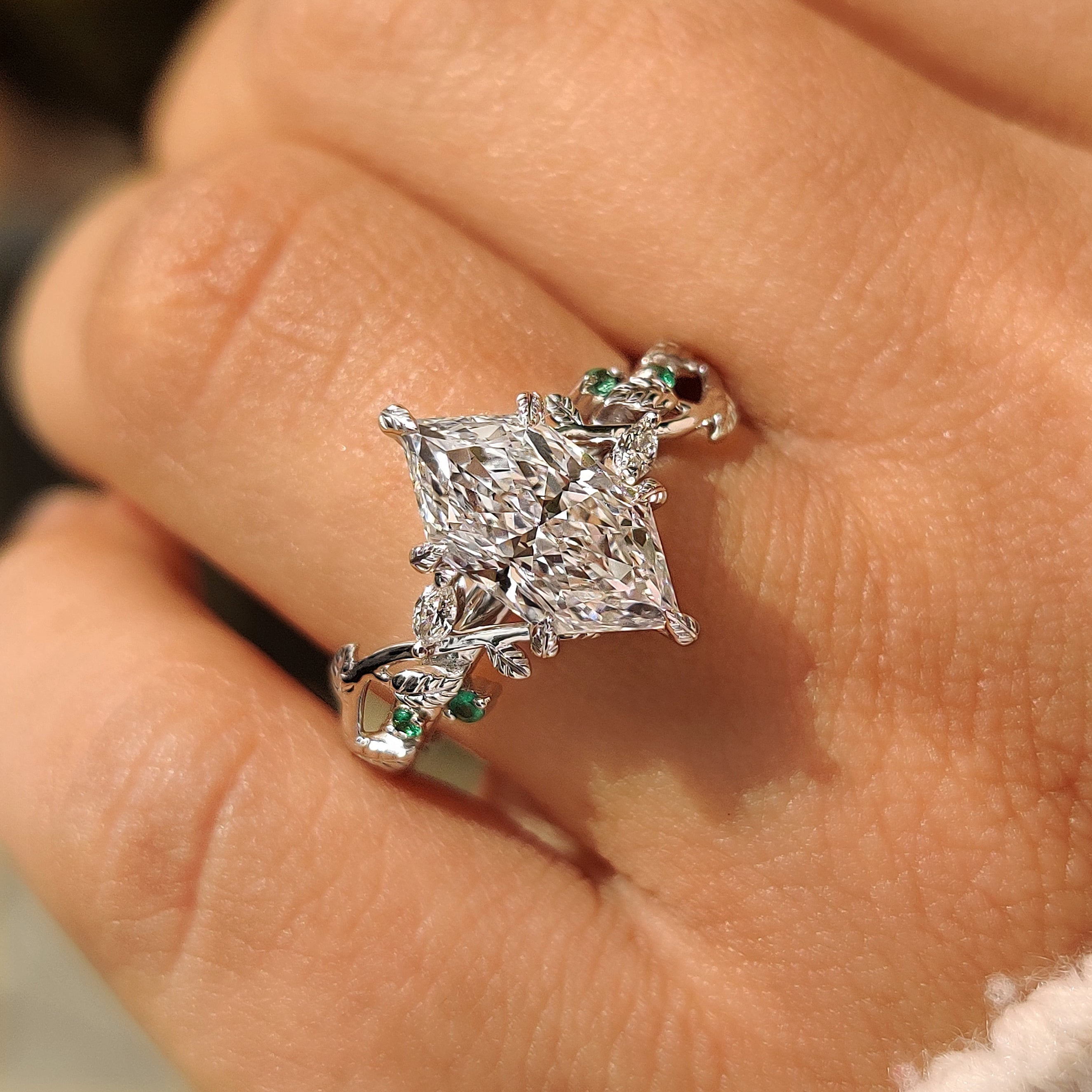 Handmade nature inspired ring with leaf prong setting details
