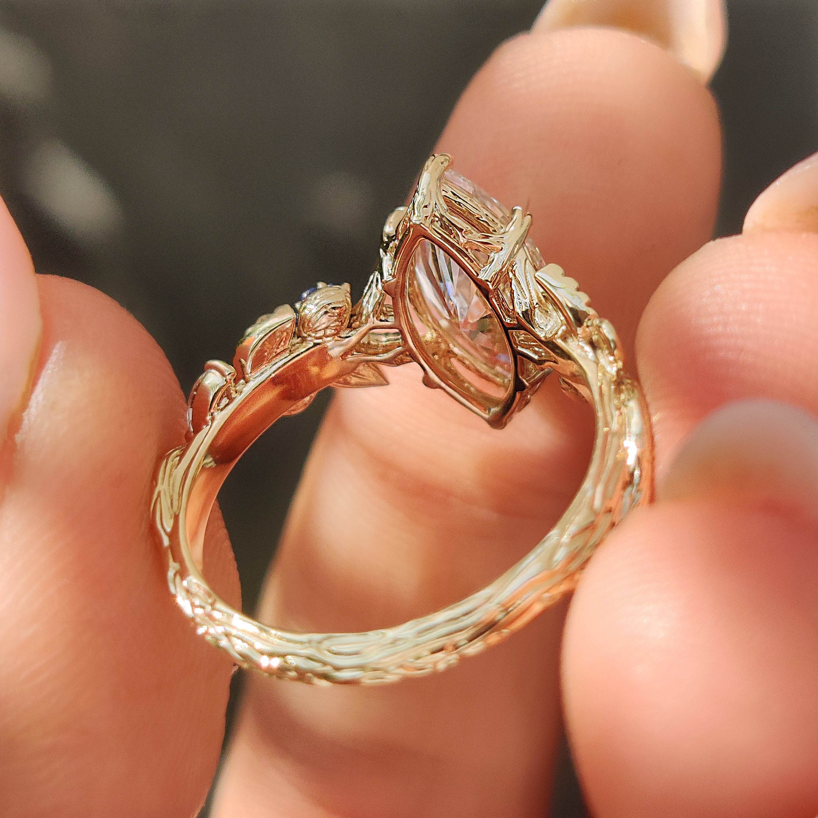 Nature inspired split shank engagement ring with woodland bark texture details.
