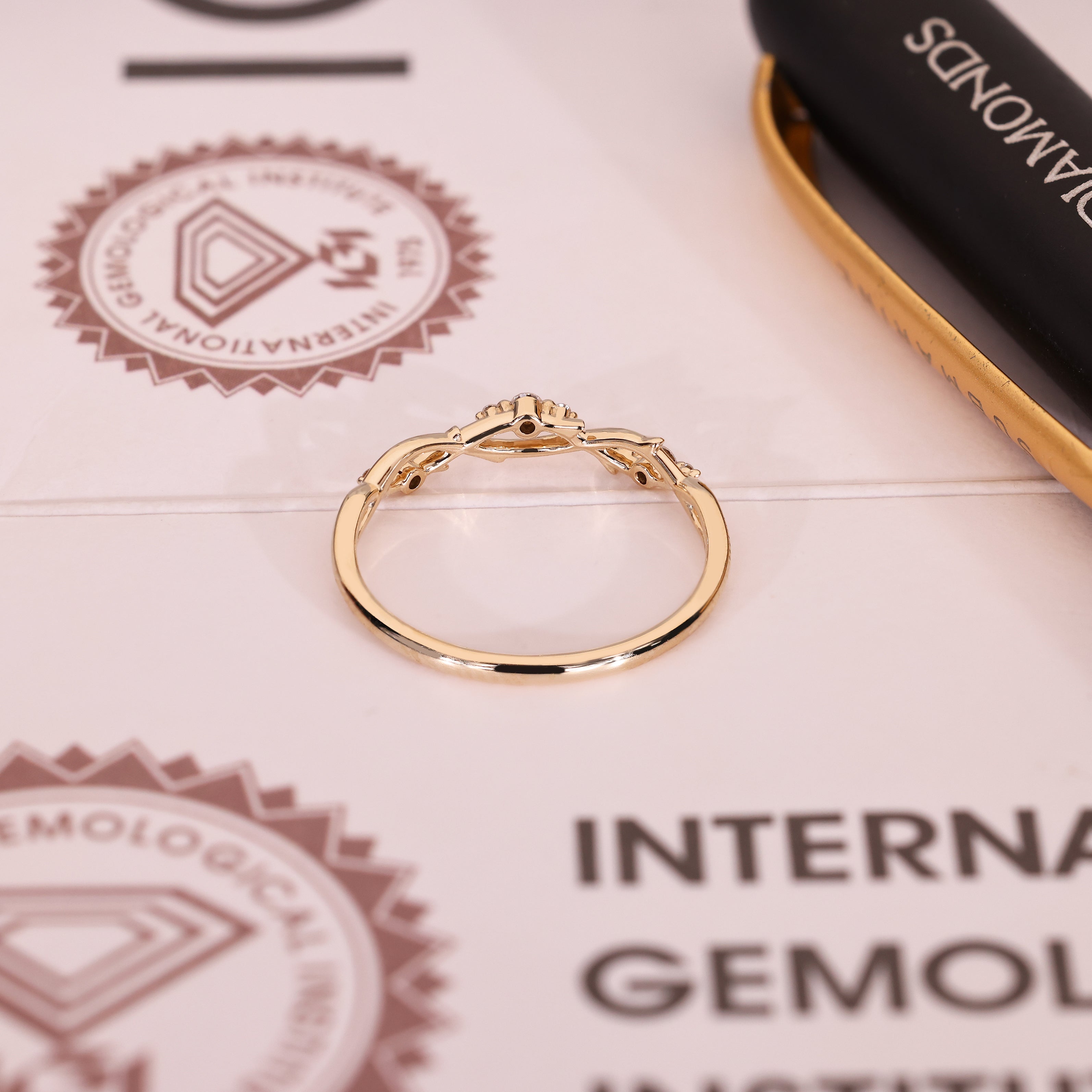Lab grown round diamond wedding band with curved vine shank