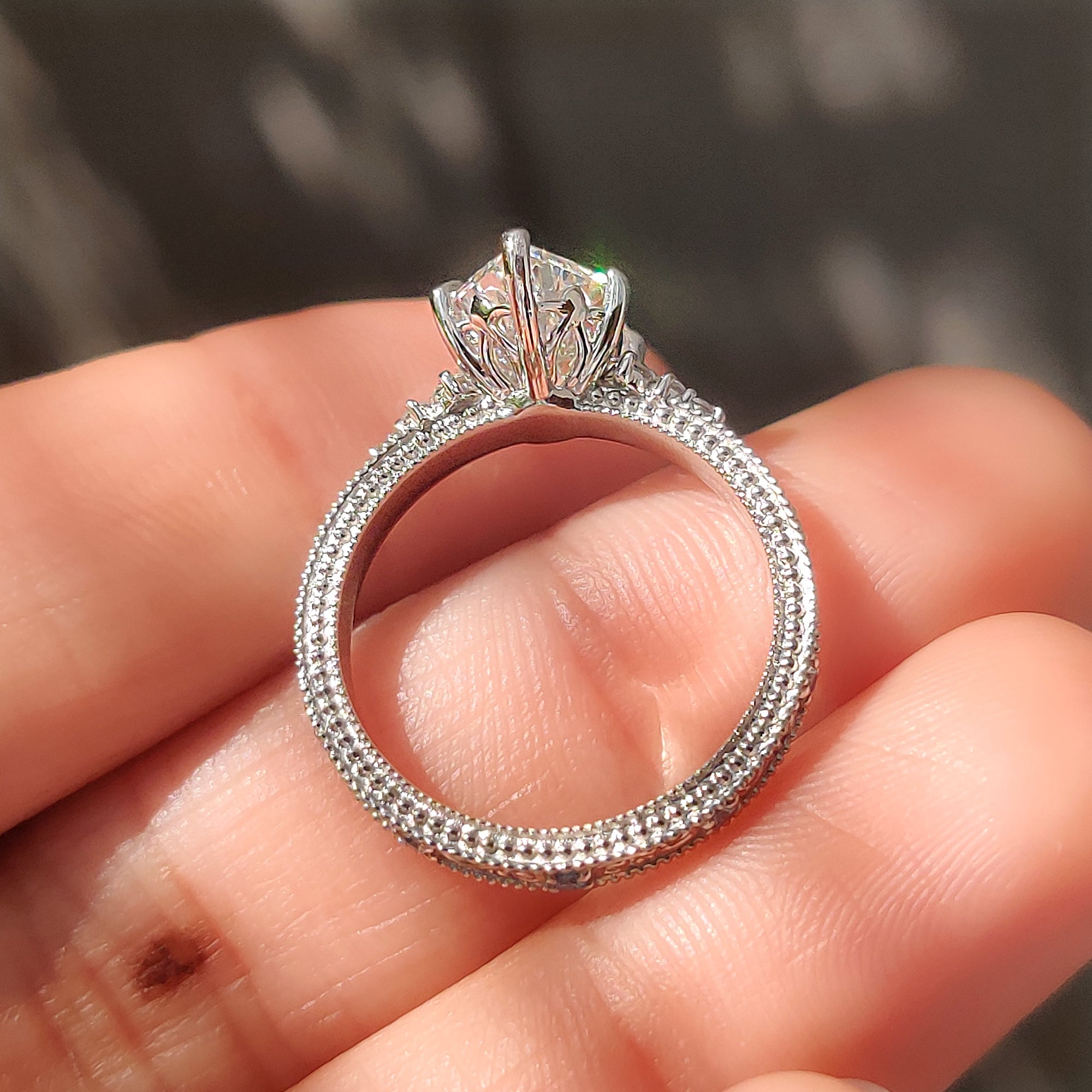 Hand engraved filigree shank on a Dutch marquise ring.

