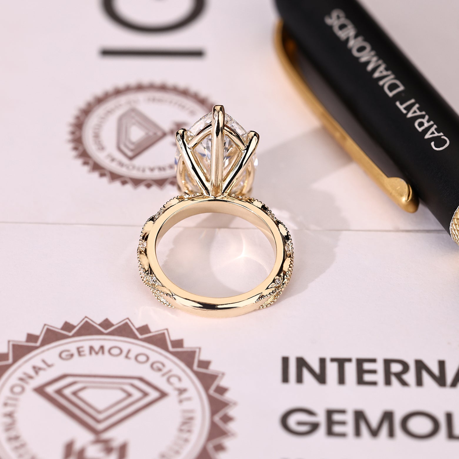 IGI certified pear cut center diamond ring
