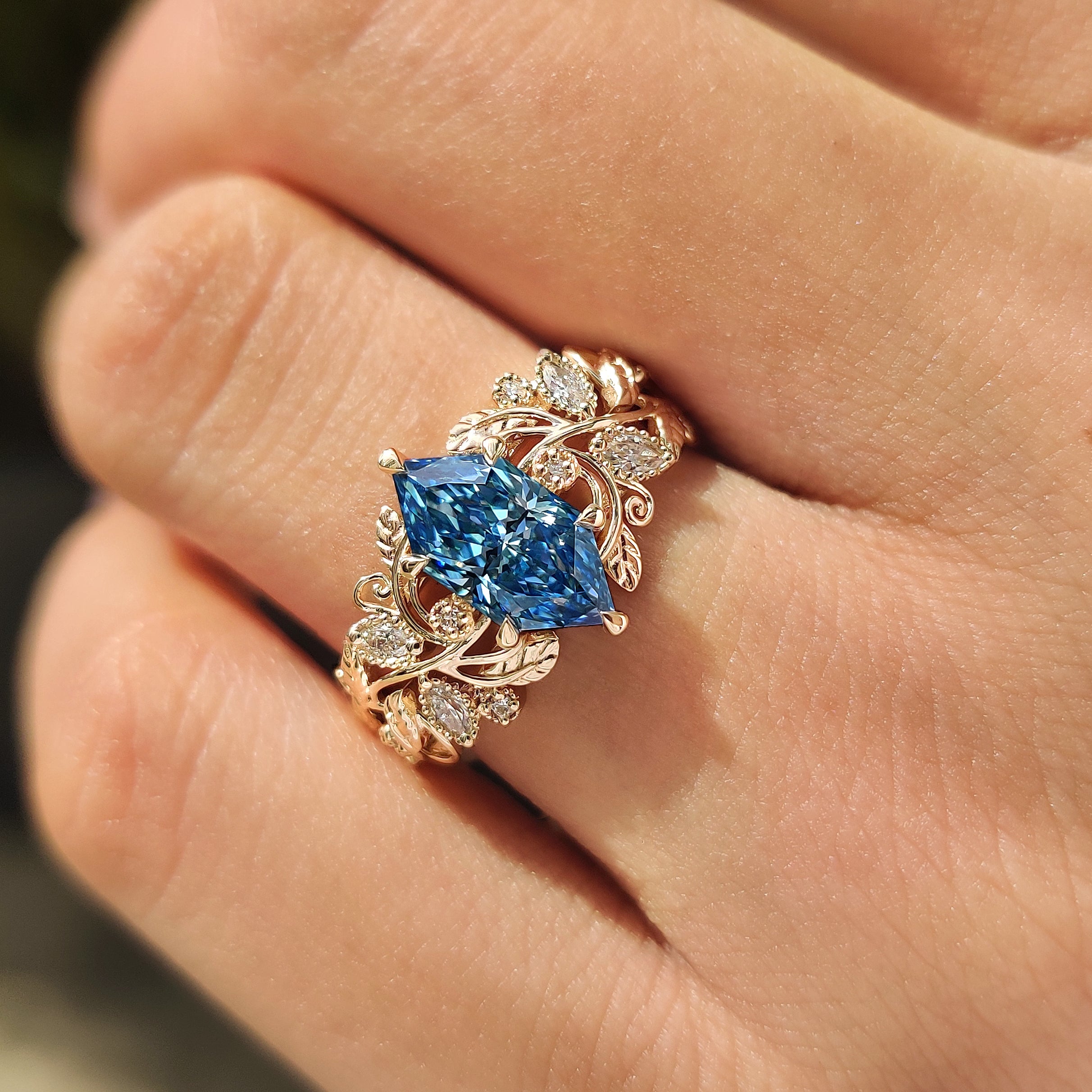 Blue Dutch marquise ring with four claw prong setting
