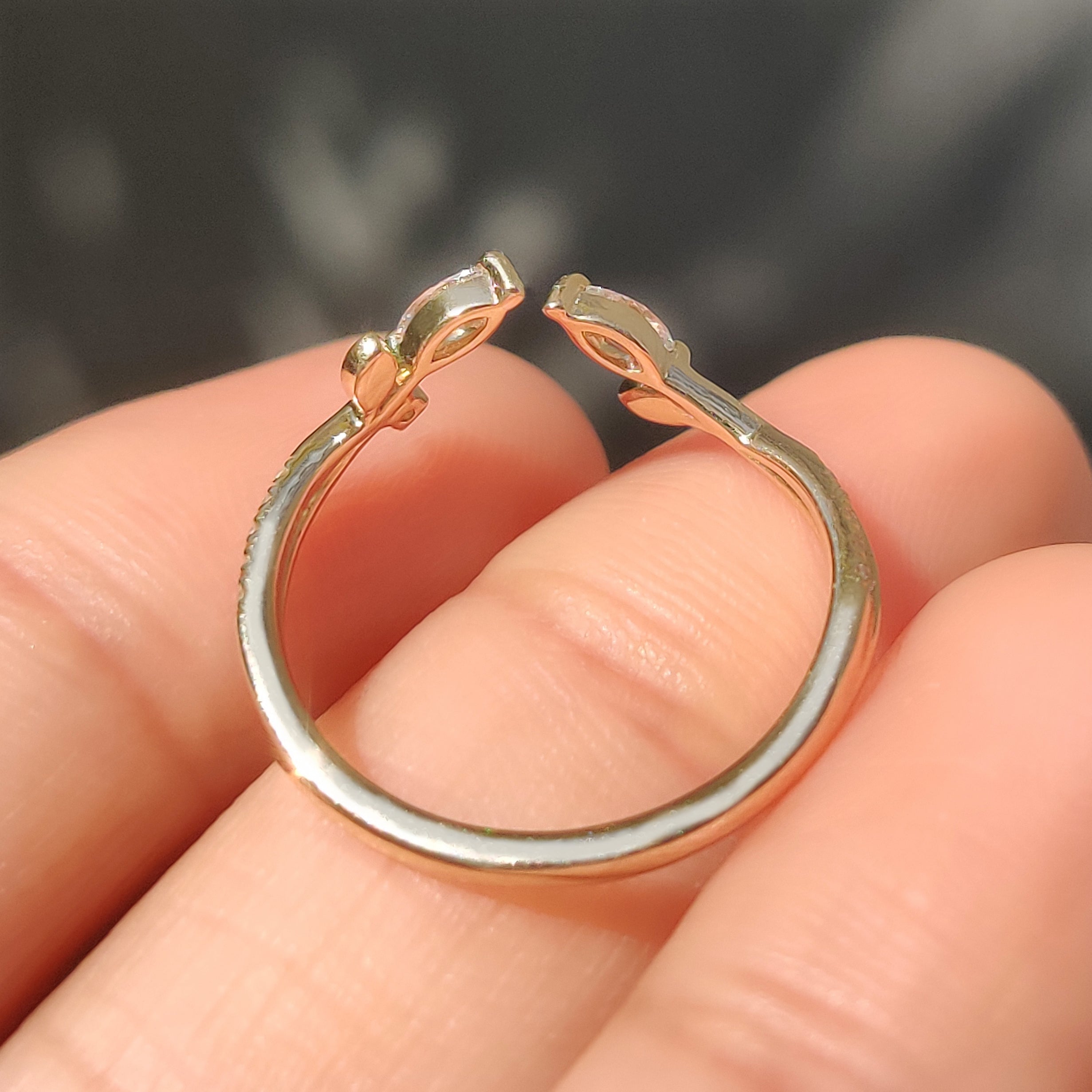 Stackable lab diamond band with marquise and round stones.
