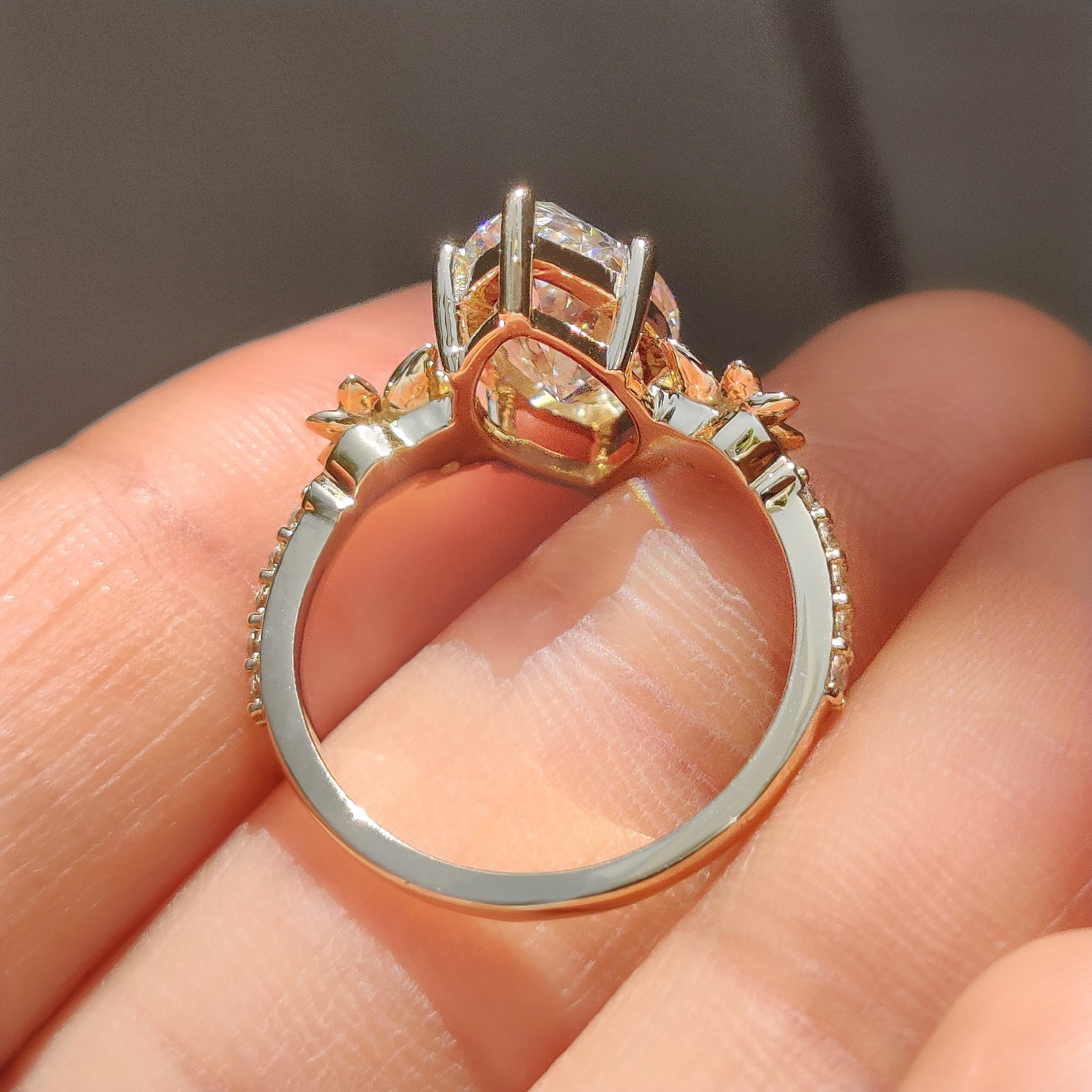 Marquise diamond ring with flower design and pave setting
