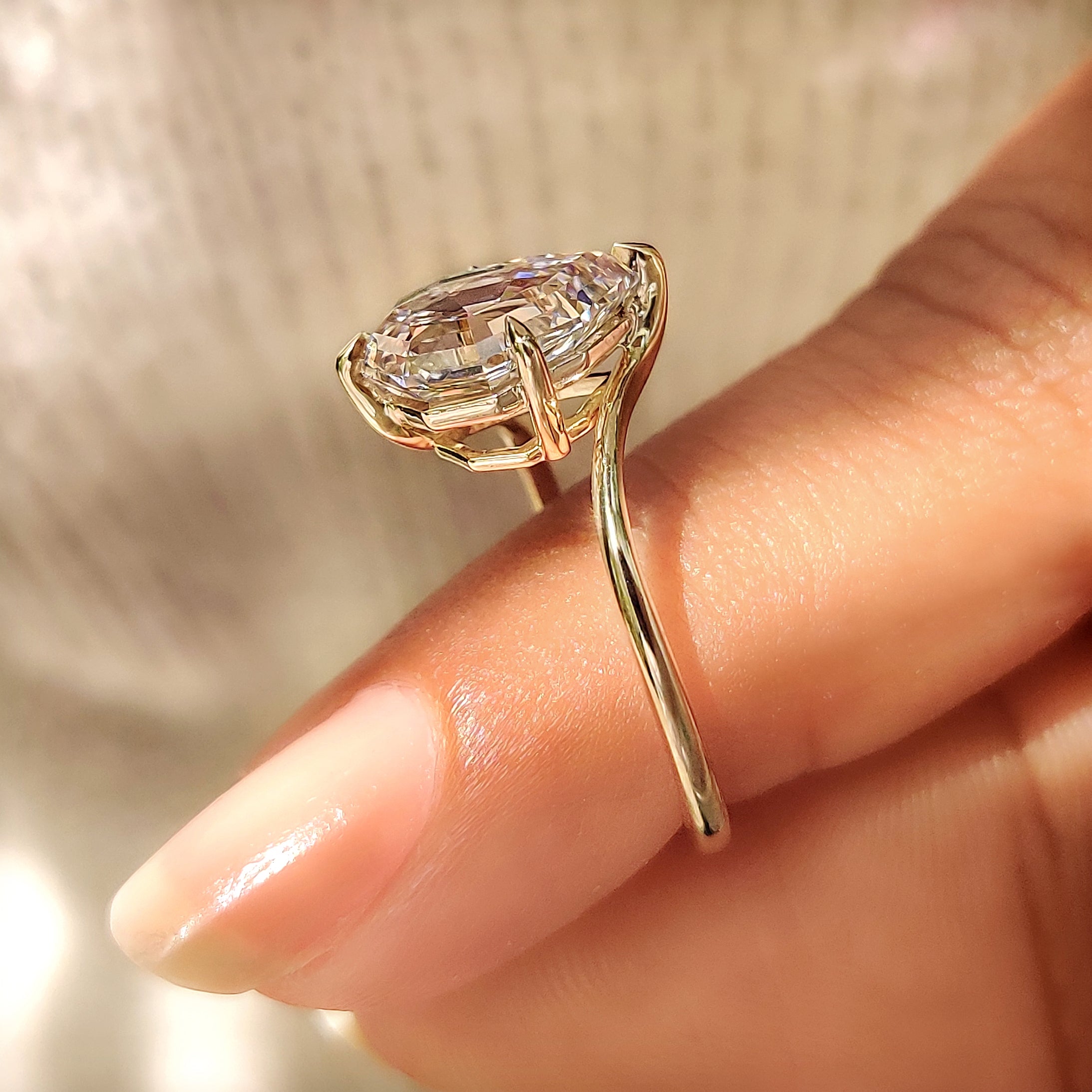 
Lab grown pear step cut diamond engagement ring.
