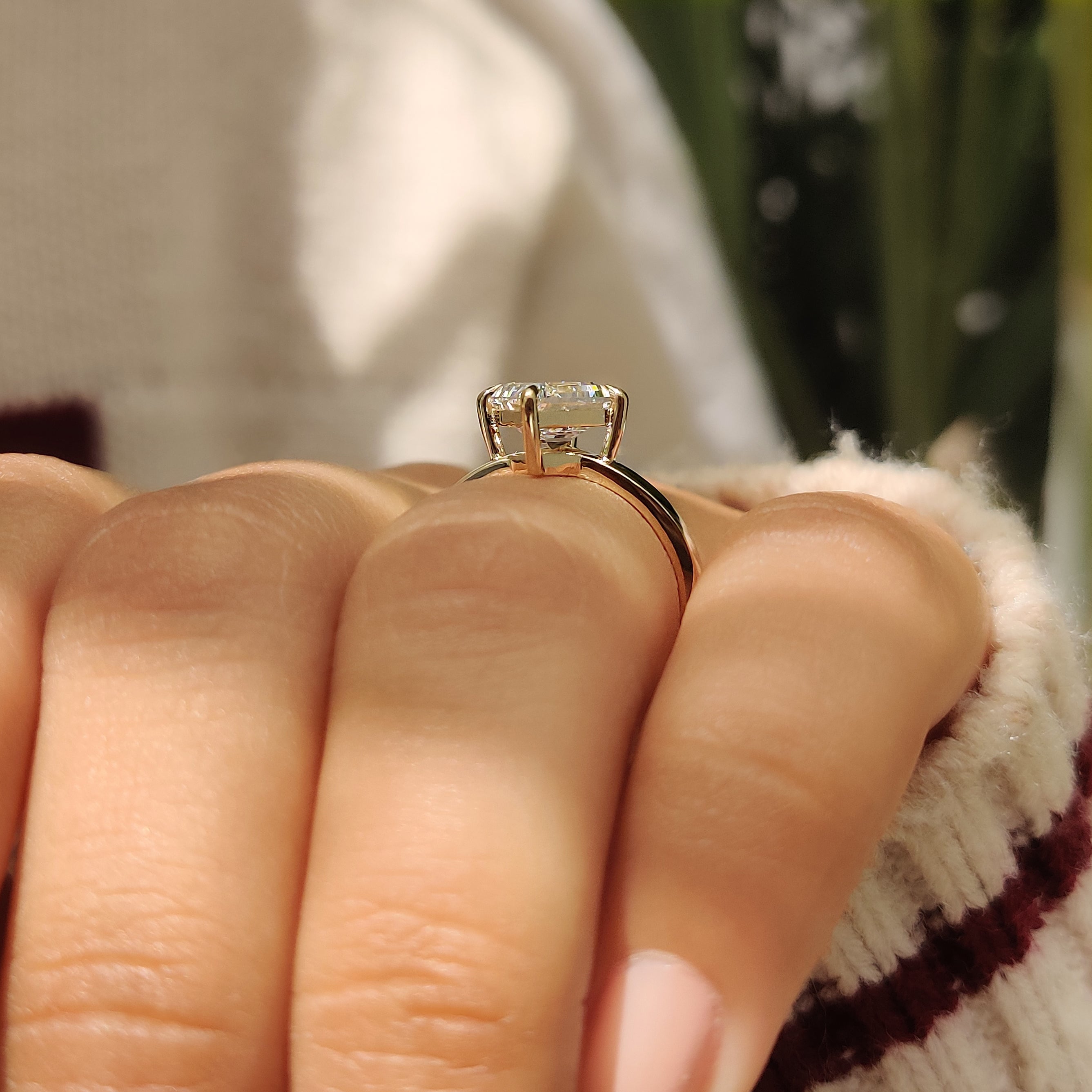 Lozenge diamond ring with compass claw prong setting details
