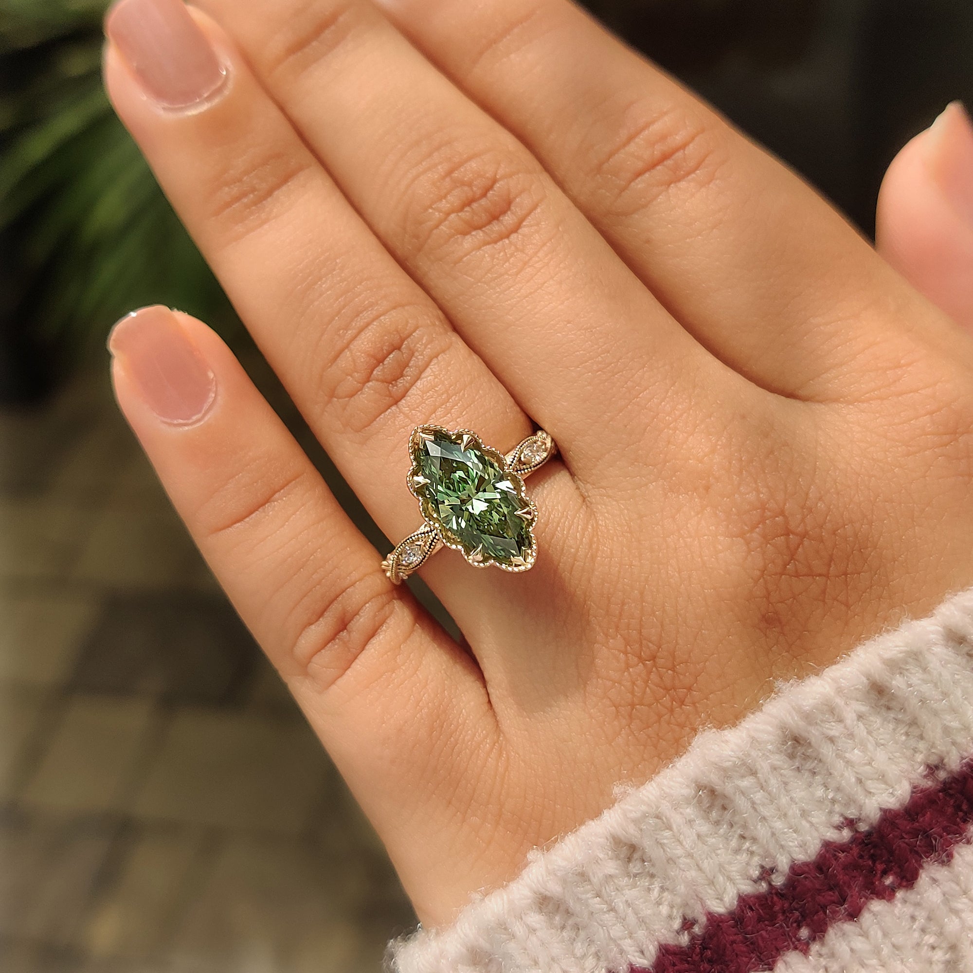 Vintage inspired filigree shank green marquise ring.
