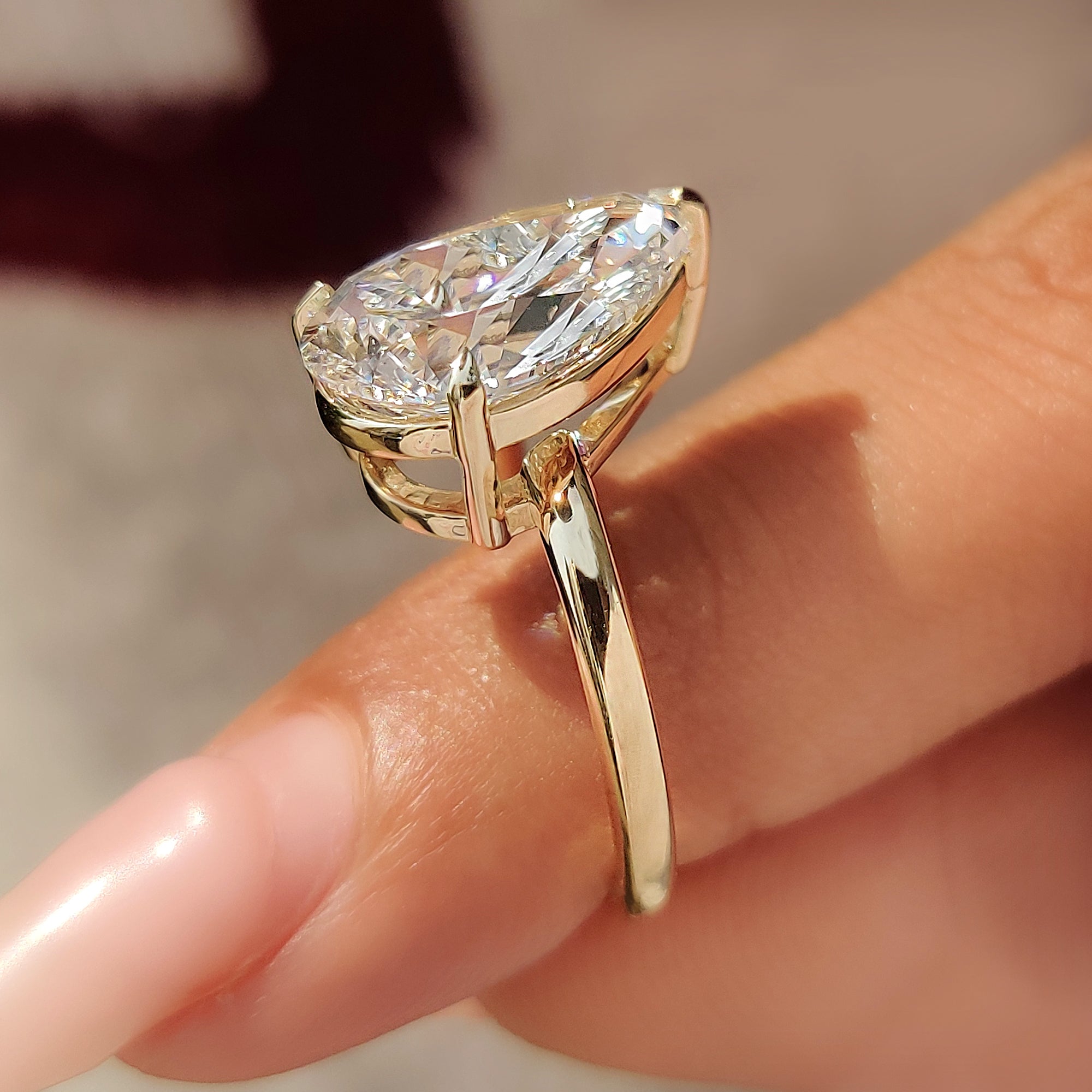 Handcrafted pear shaped engagement ring by Carat Diamonds.
