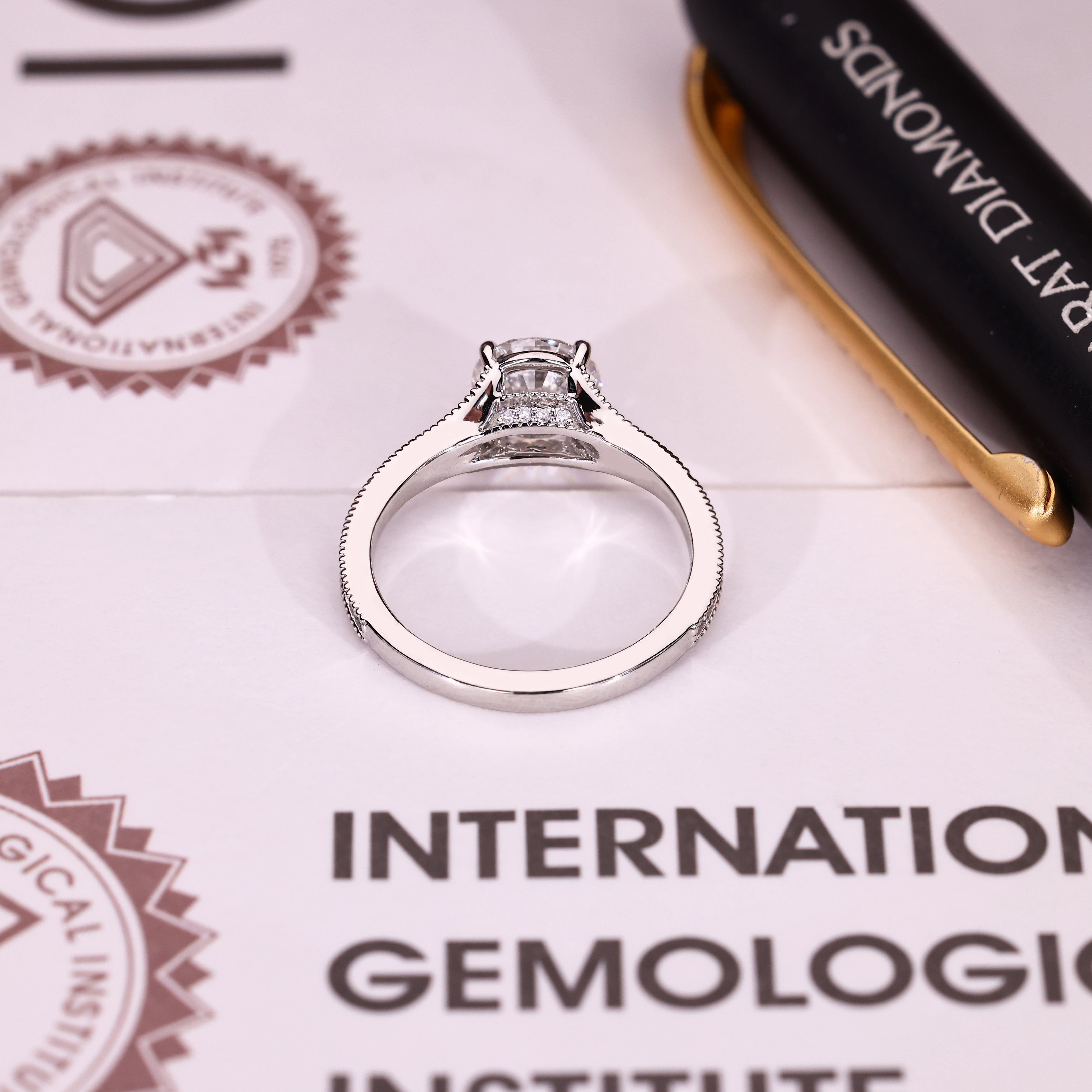 Handmade round engagement ring with milgrain detailing
