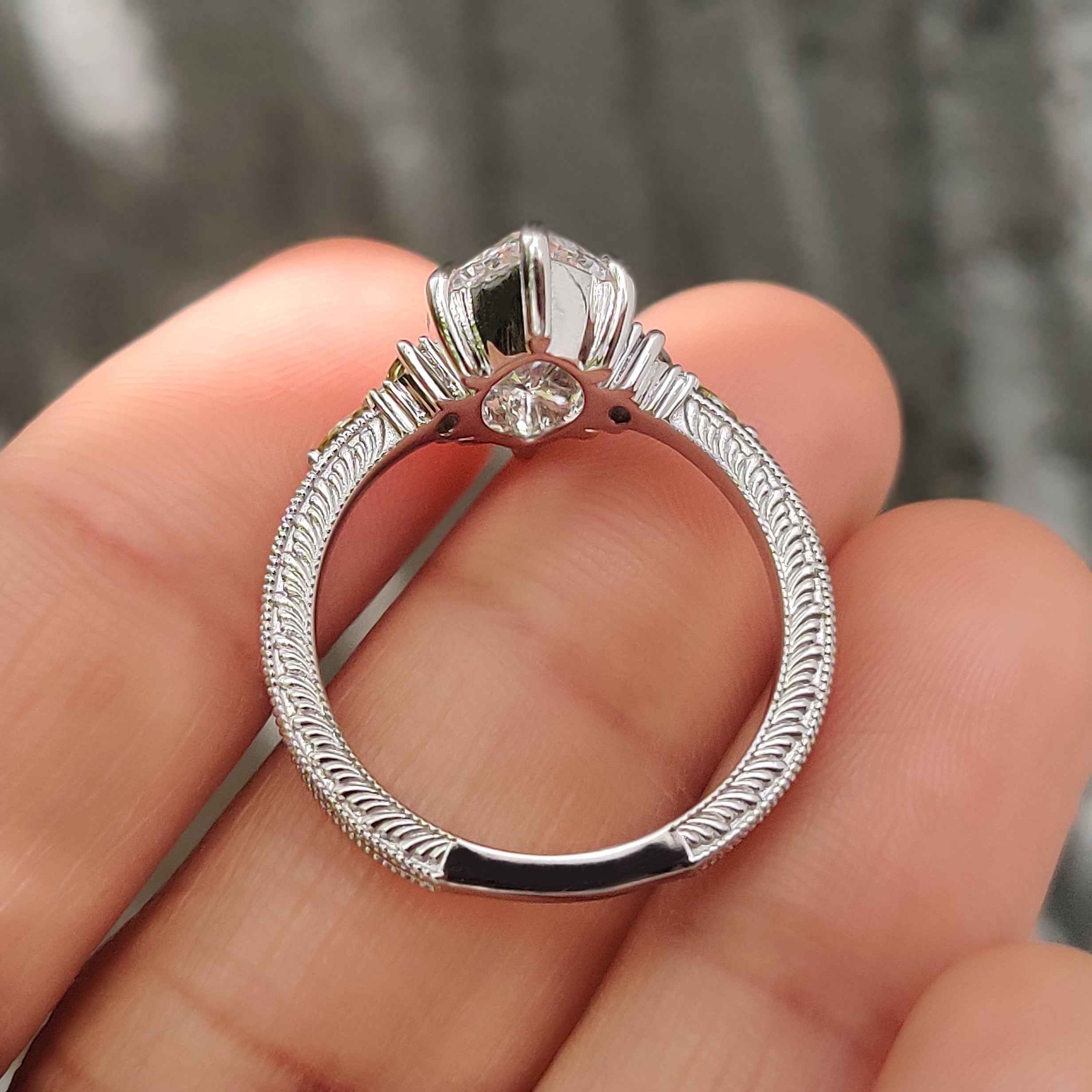 Handmade marquise ring with peridot marquise side stones design
