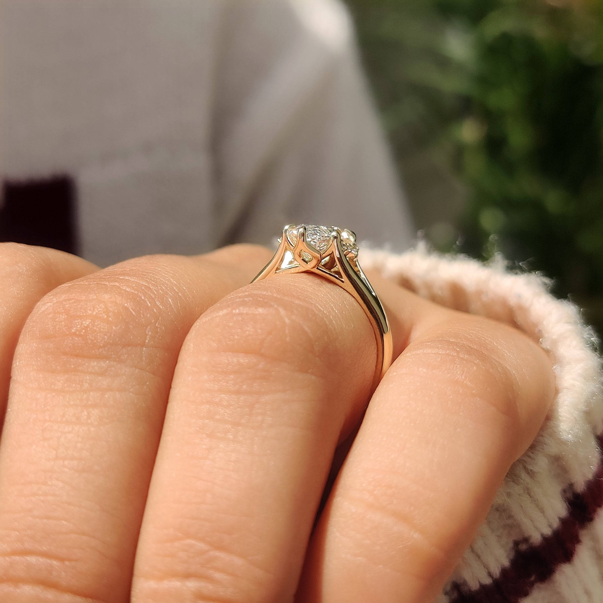 Marquise diamond ring with hidden flower pink ruby accent
