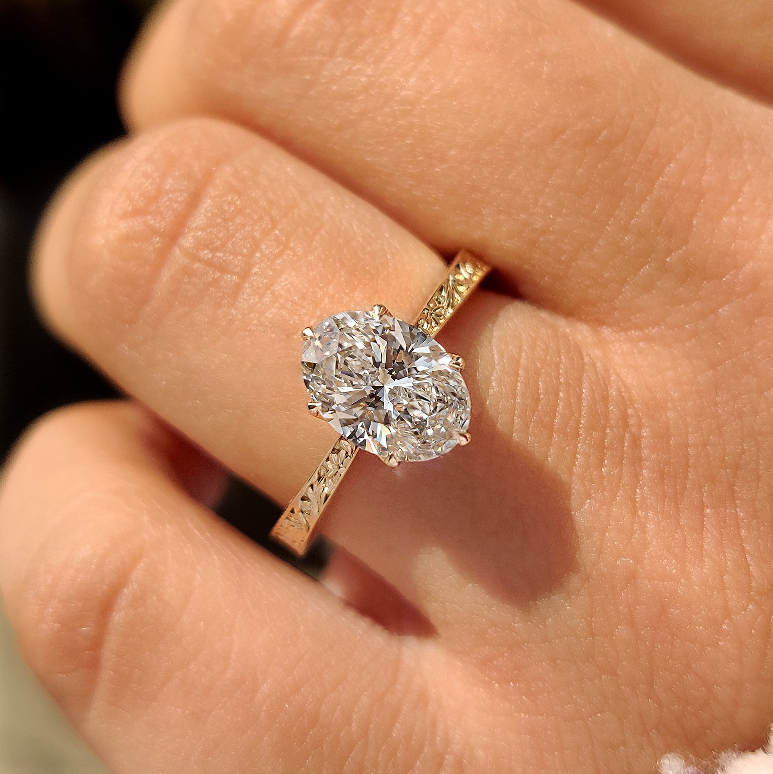 Solitaire Oval Diamond Ring with Six Claw Prongs
