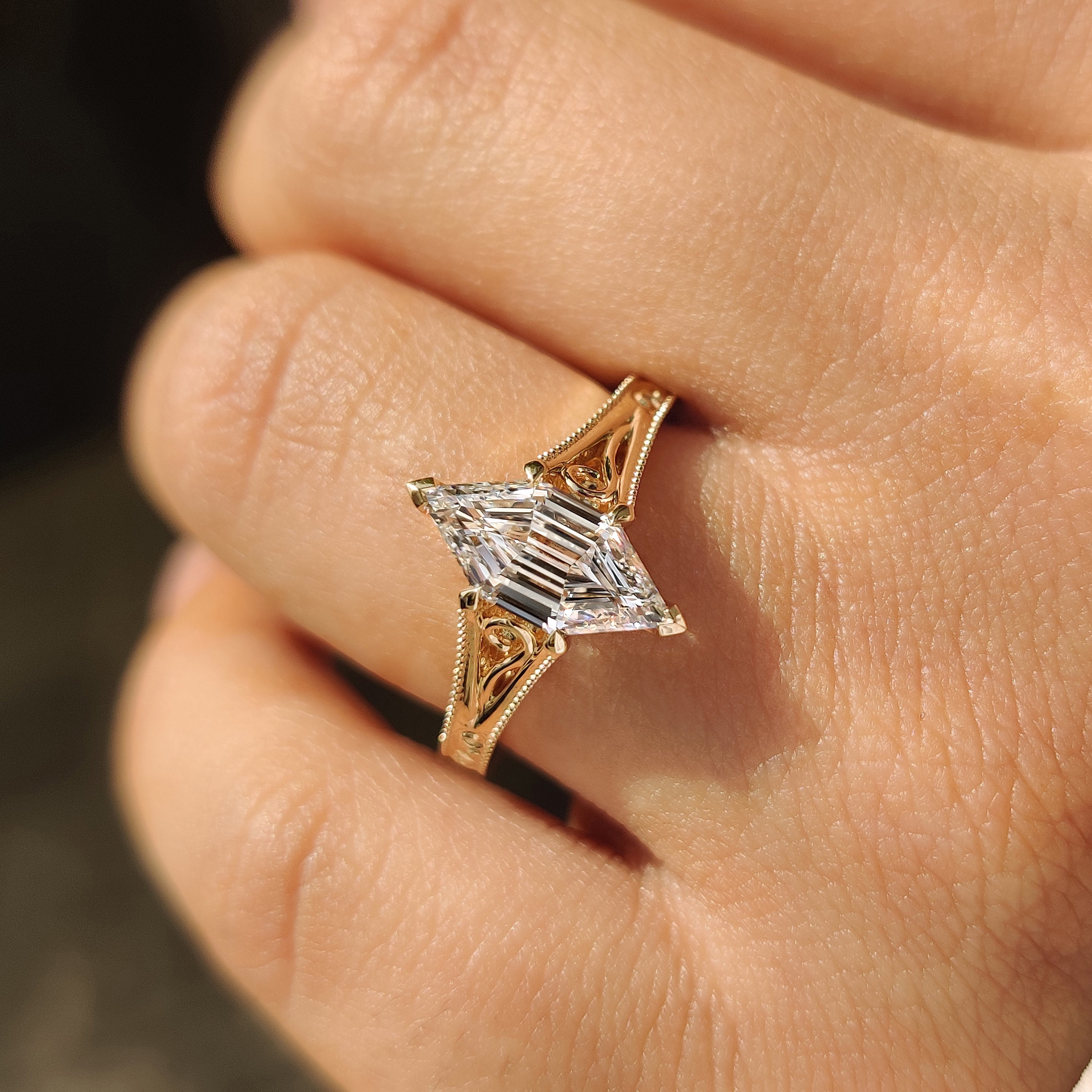 Hexagon cut lab diamond ring with secure four claw prongs
