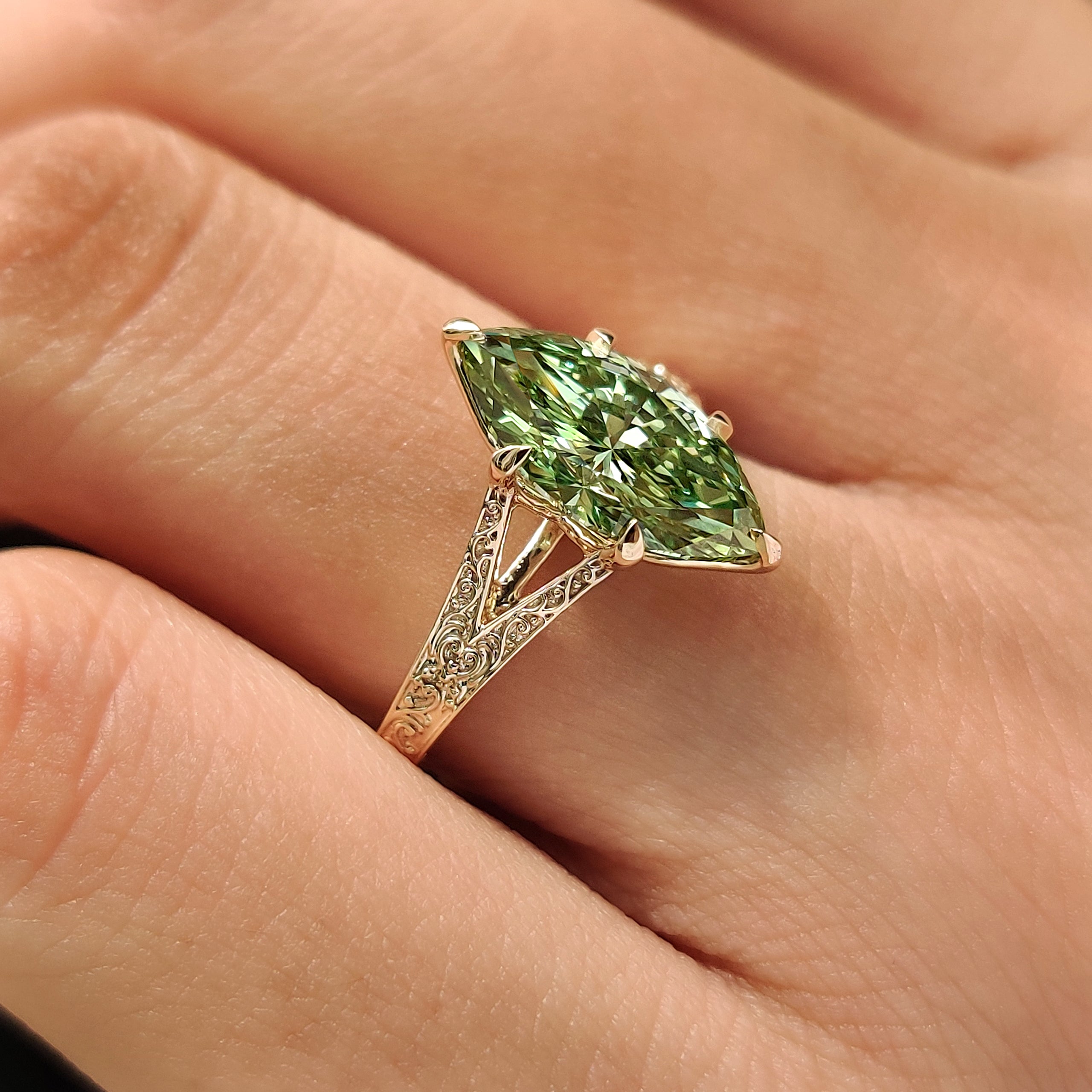 Handmade green marquise diamond ring with six claw prongs