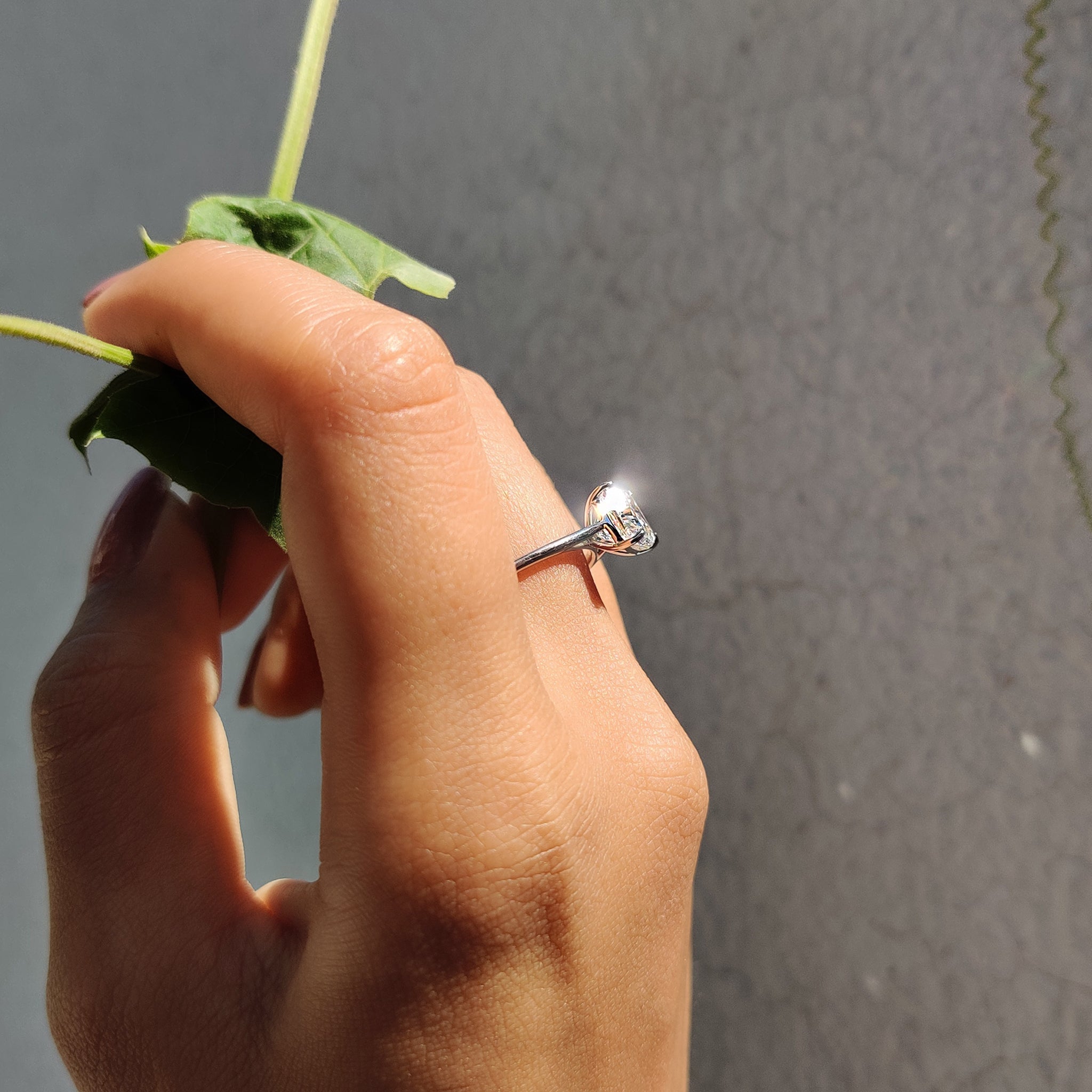 The cushion solitaire ring brings timeless beauty to any proposal.
