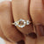 This rose cut moissanite engagement ring showcases vintage elegance.