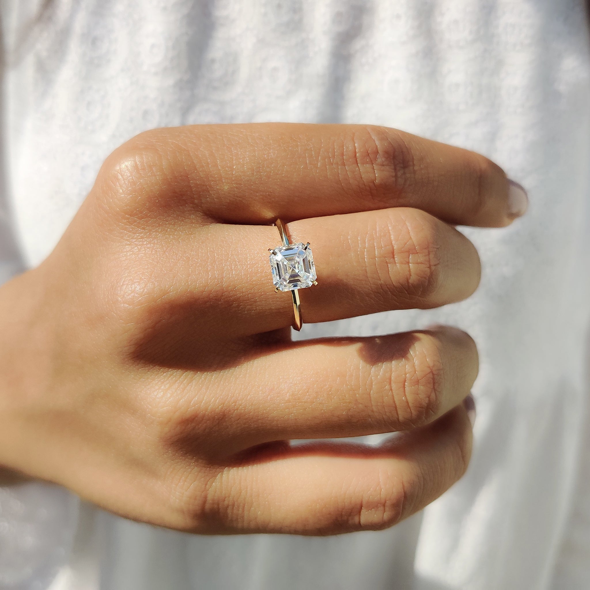 Basket setting ring featuring a modern and secure design for moissanite.