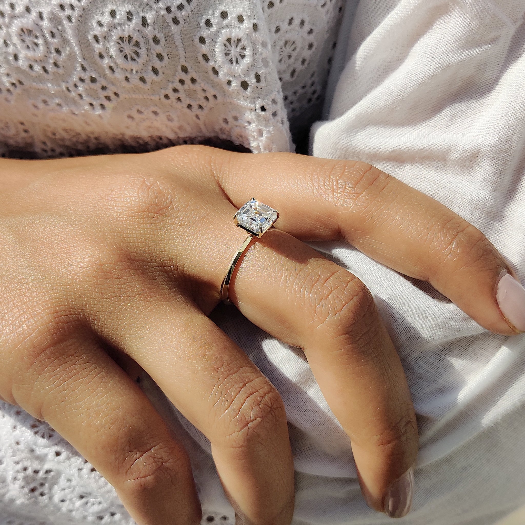 Stunning asscher cut solitaire ring, a perfect symbol of love and commitment.
